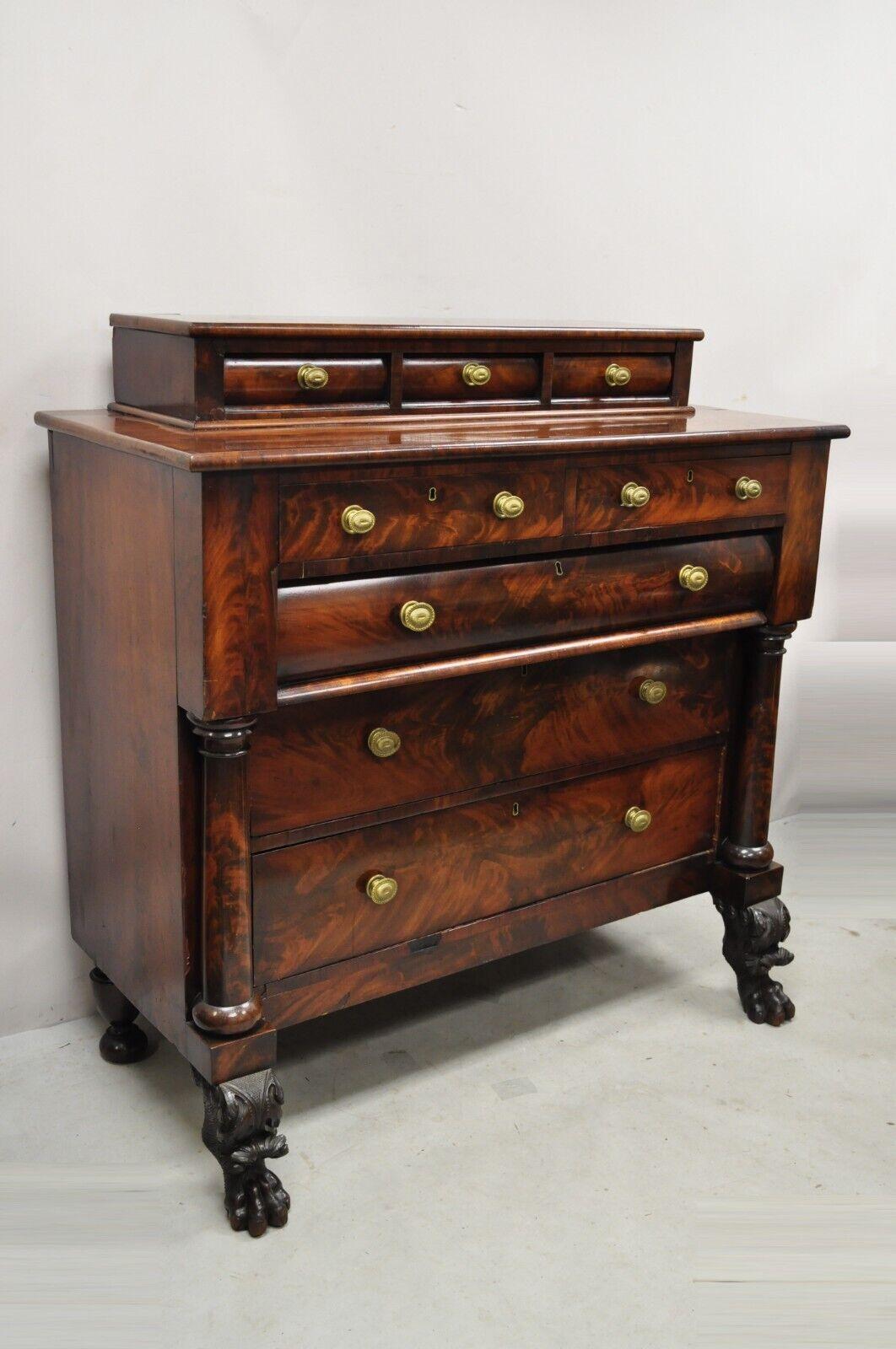 Antique American Empire Crotch Mahogany Chest Drawers Step Back Dresser with Paw Feet. Item features column supports, lift off upper small 3 drawer section, beautiful wood grain, no key but unlocked, 8 dovetailed drawers, carved paw feet, solid