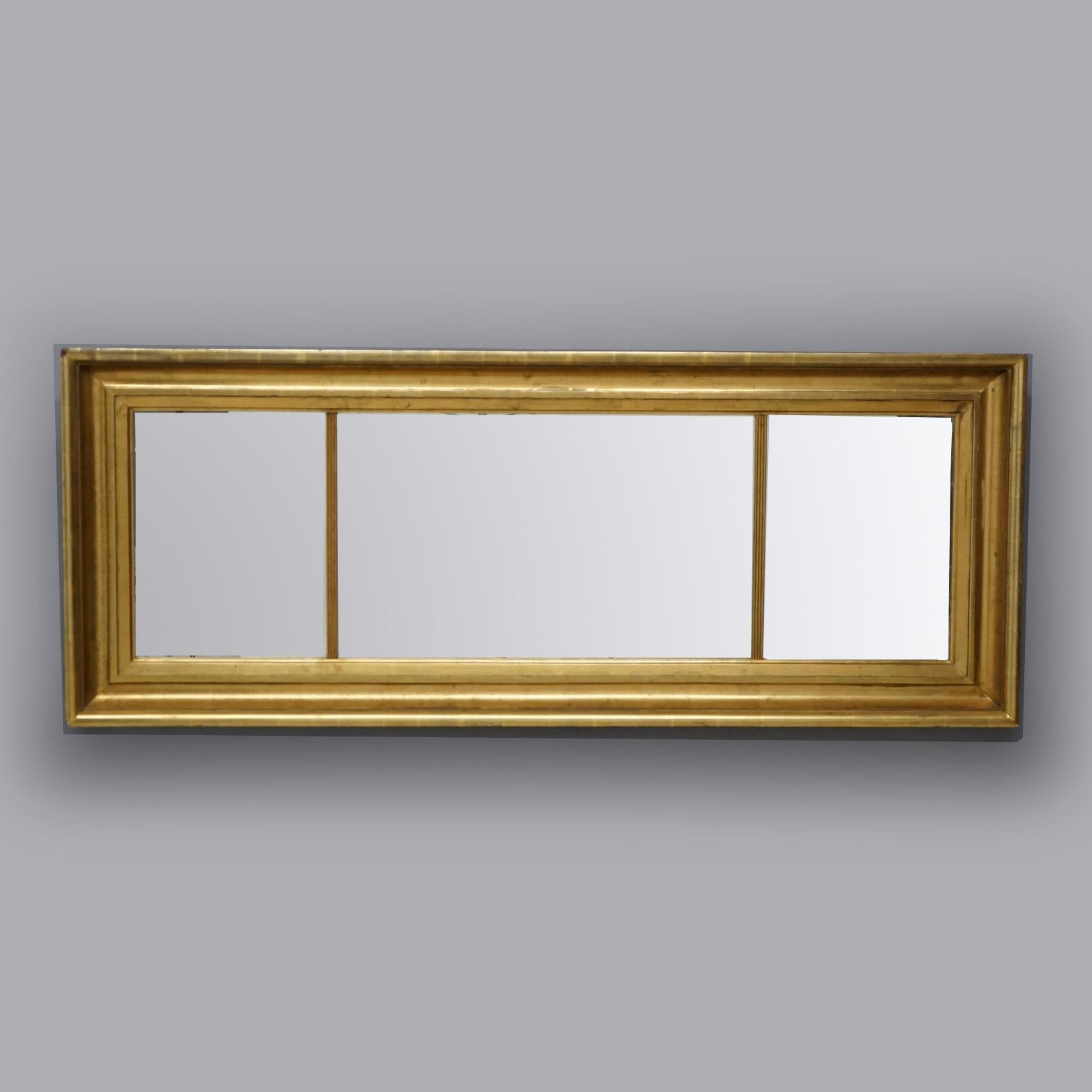 An antique American Empire triptych wall mirror offers giltwood frame having reeded dividers, c1850

Measures - 26.75