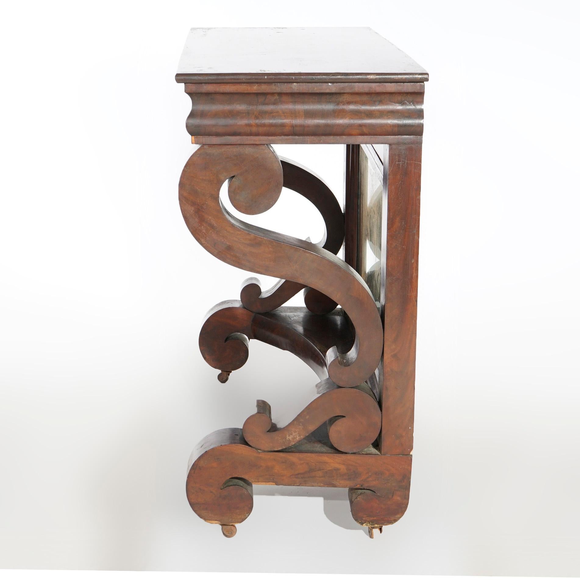 Antique American Empire Flame Mahogany Scroll Form Mirrored Pier Table, c1840 In Good Condition In Big Flats, NY