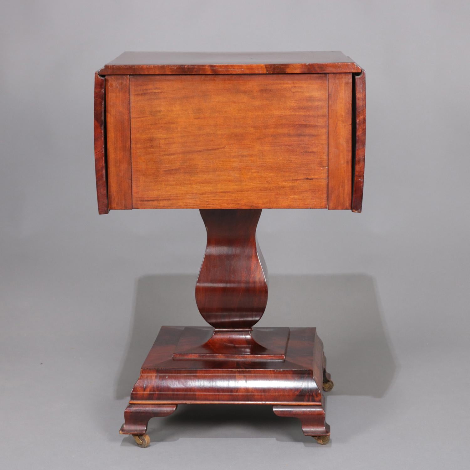 Antique American Empire Flame Mahogany Two-Drawer Drop-Leaf Sewing Stand In Good Condition In Big Flats, NY