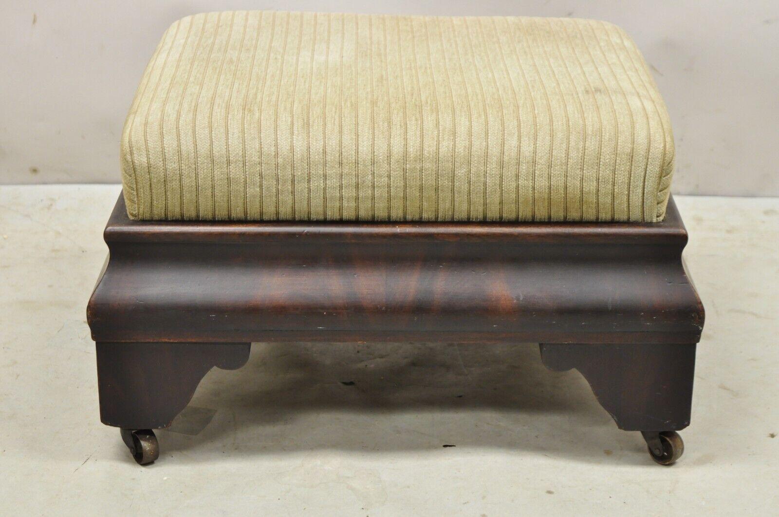 Antique American Empire Flame Mahogany Upholstered Ottoman Footstool on Wheels In Good Condition In Philadelphia, PA