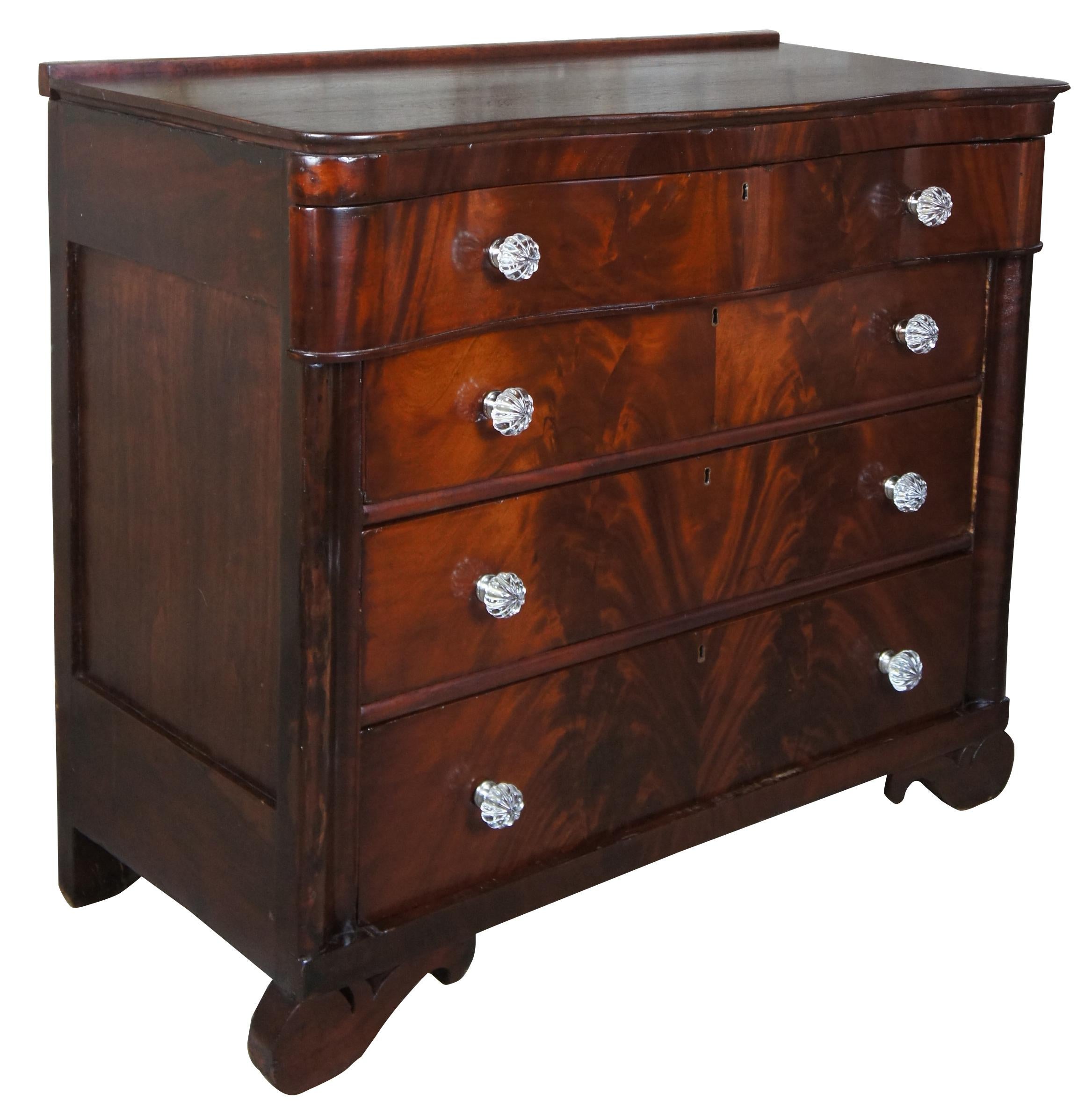Antique American Empire flamed mahogany serpentine chest of drawers or dresser

Mid-19th century American Empire chest of four drawers. Perfect for use in bedroom or dining area. Features a serpentine front, lockable drawers and glass drawer