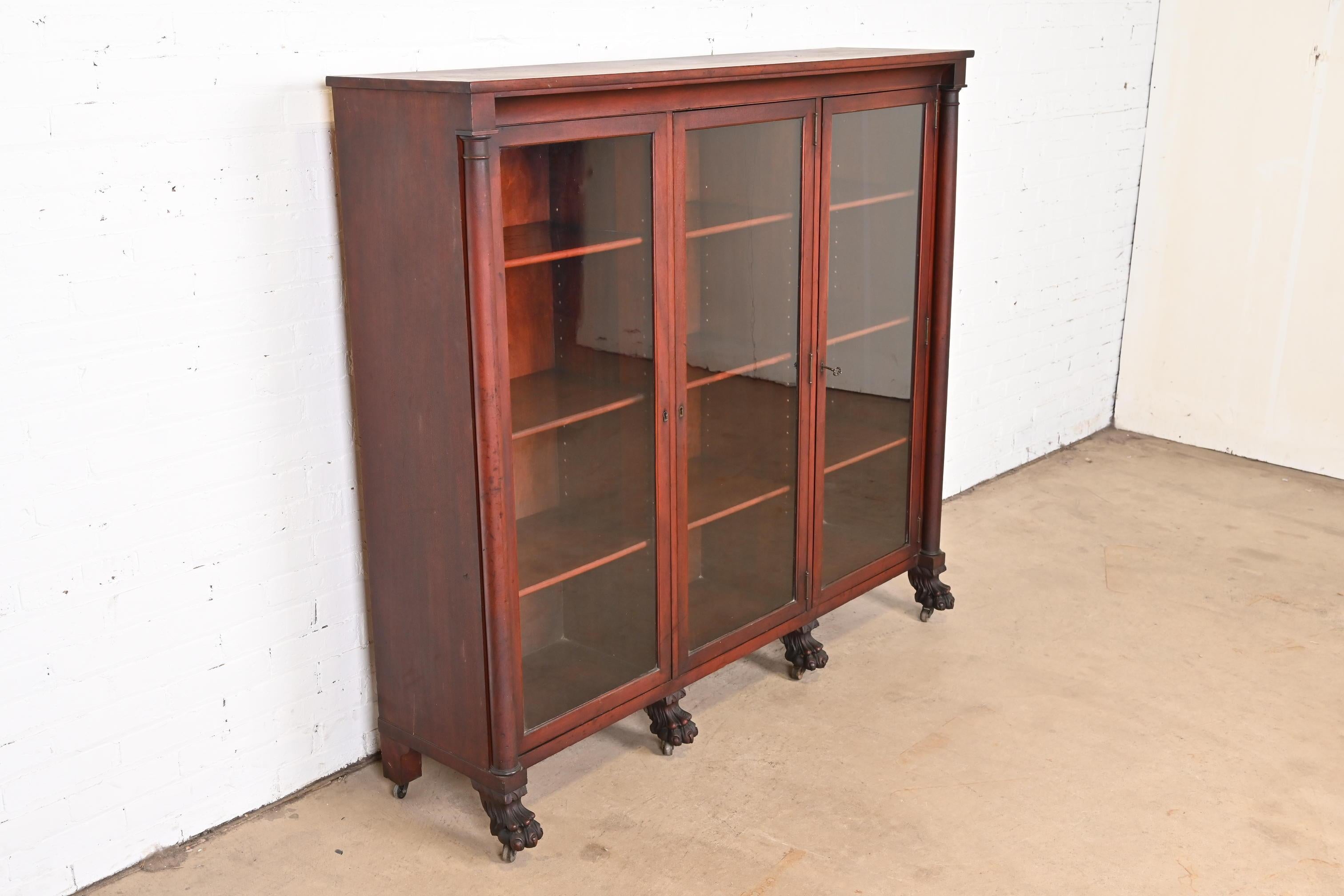 Antique American Empire Mahogany Triple Bookcase with Carved Lion Paw Feet 1