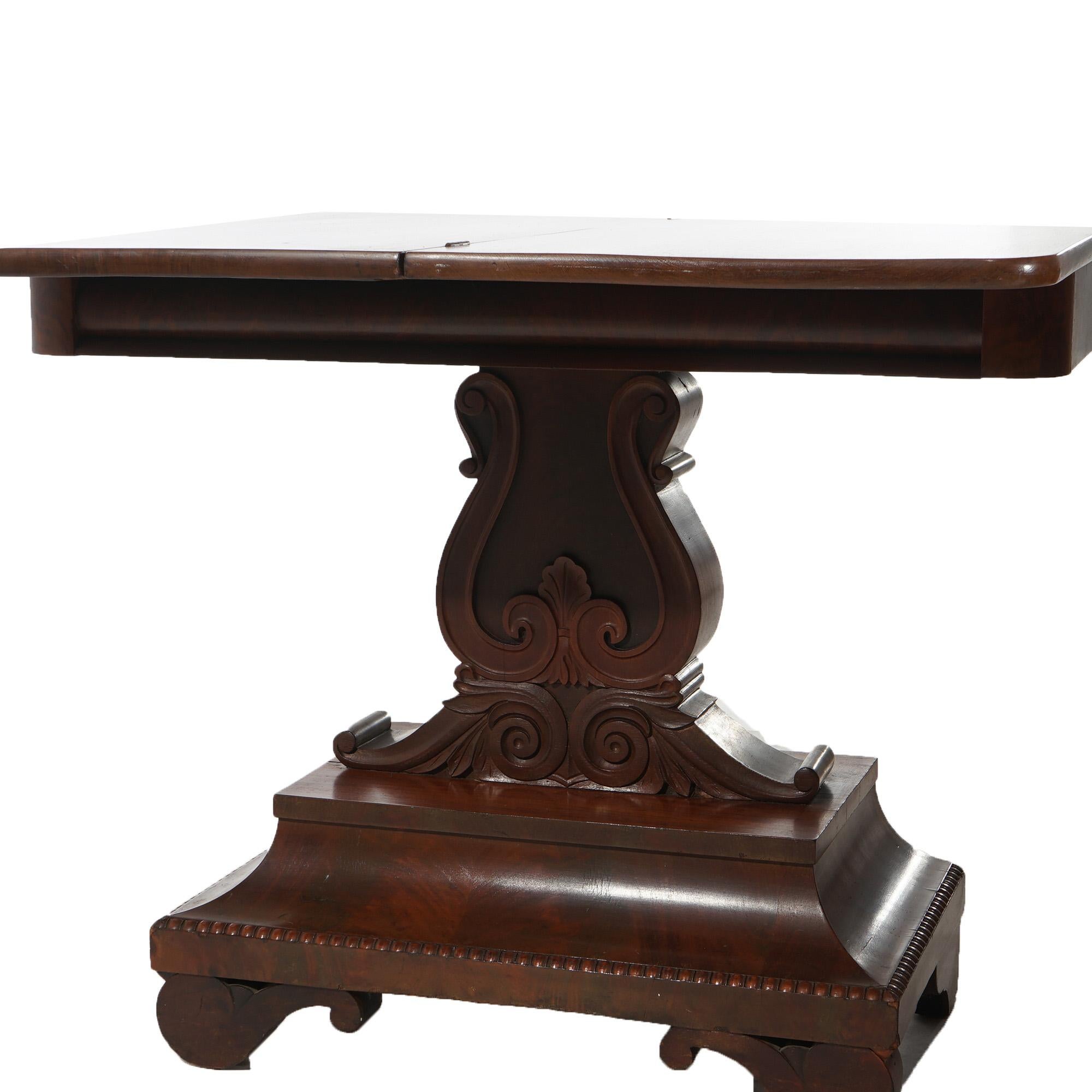 ***Ask About Reduced In-House Delivery Rates - Reliable Professional Service & Fully Insured***
Antique American Empire Neoclassical Greco Flame Mahogany Card Table with Ogee Top and Raised on Urn Form Pedestal C1840

Measures- 29.75''H x 35.75''W x