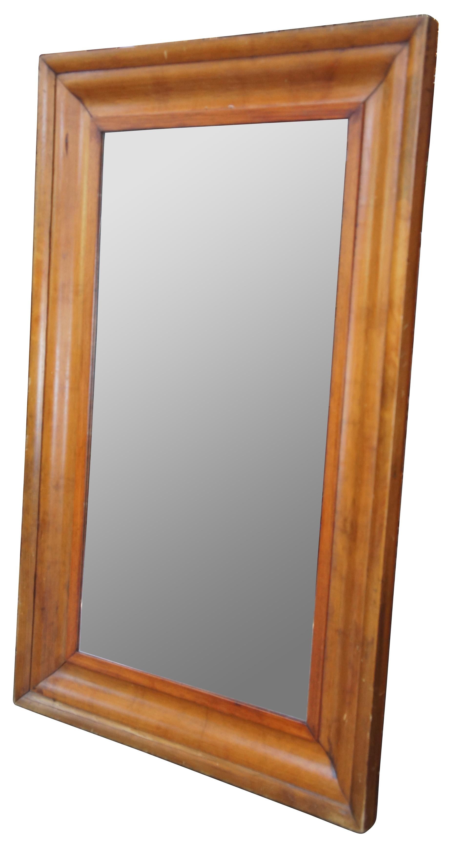 Antique 19th century ogee wall hanging mirror. Made from pine. 

mirror 20