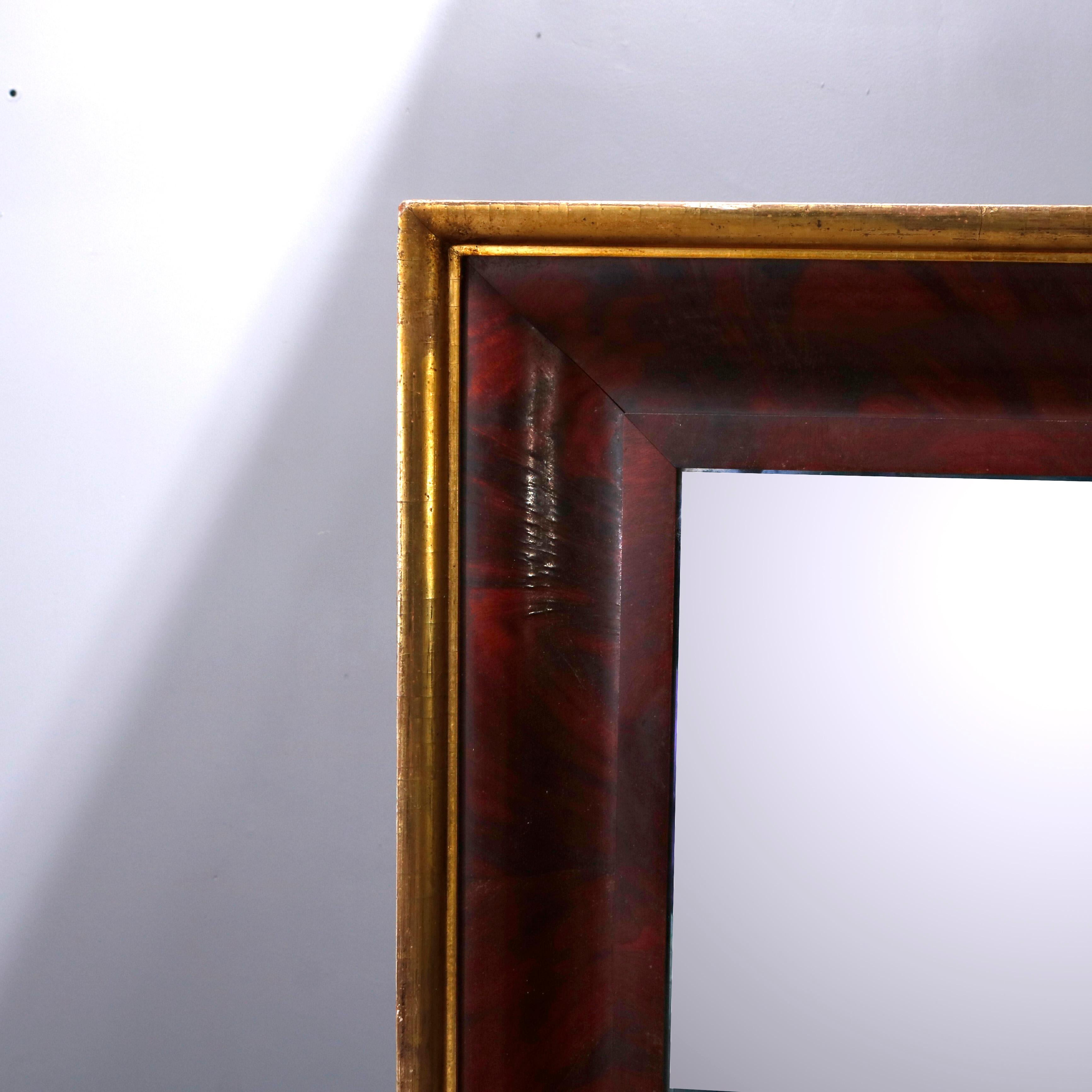 An antique American Empire trumeau wall mirror offers a flame mahogany ogee frame with gilt bordering and housing double beveled mirrors, 19th century

***DELIVERY NOTICE – Due to COVID-19 we have employed LIMITED-TO-NO-CONTACT PRACTICES in the