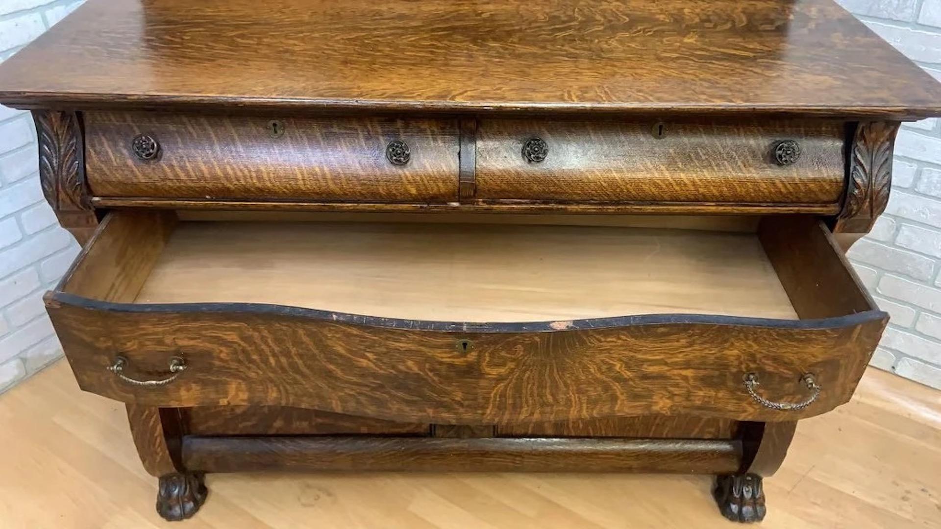 Antique American Empire Quarter Sawn Oak Buffet / Sideboard or Bar Cabinet

This antique American Empire sideboard buffet server has quarter sawn tiger oak wood grain. It features two drawers at top, one large drawer at base, and two doors with