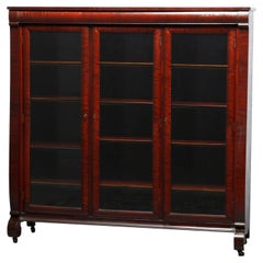 Antique American Empire Style Three Door Flame Mahogany Bookcase, Circa 1890