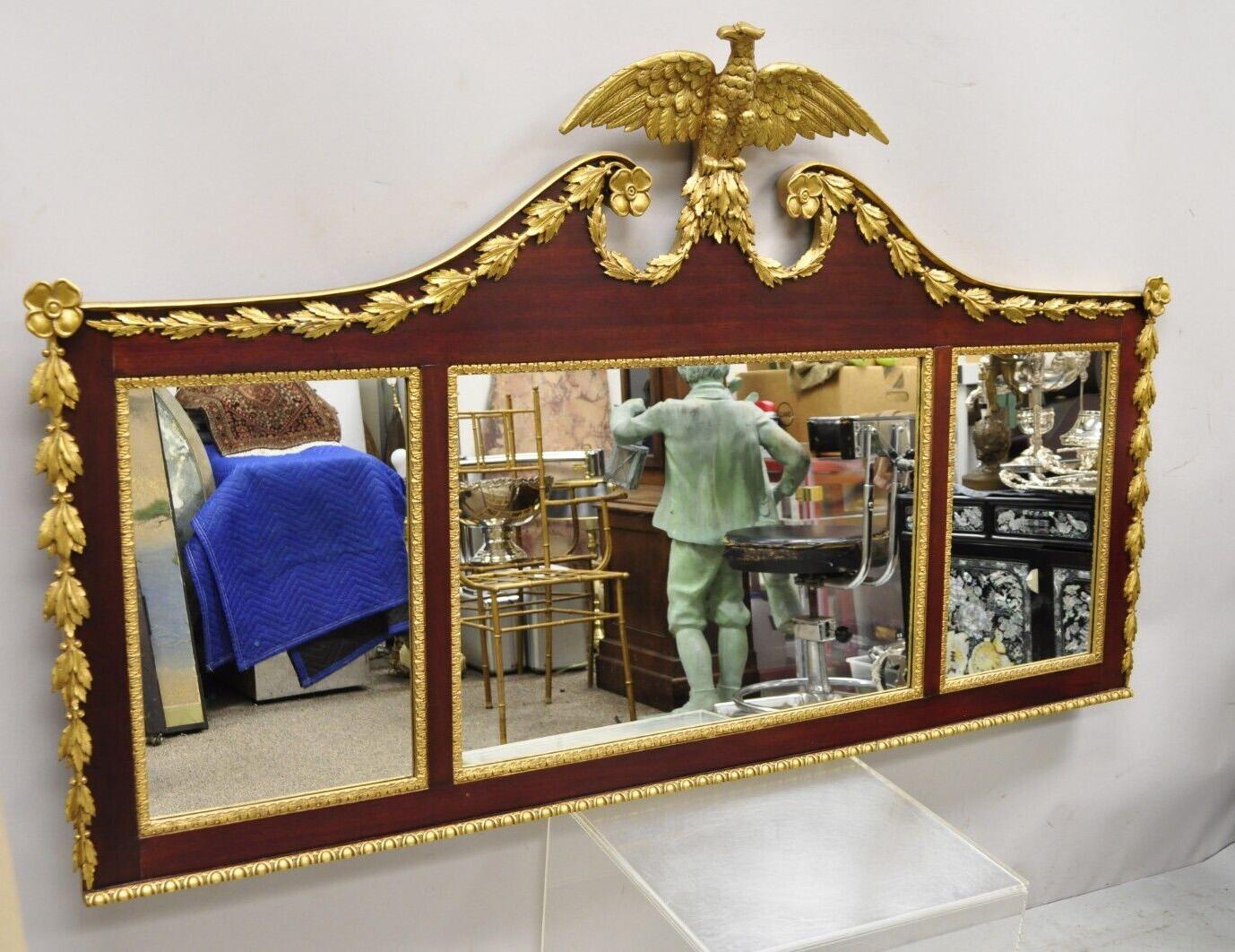 Antique American Federal gilt carved overmantle triple mirror with gold eagle. Item featured is an Impressive item, gold gold gilt carved eagle pediment, mahogany wood frame, triple mirror, gold gilt accents, very nice antique item, quality American