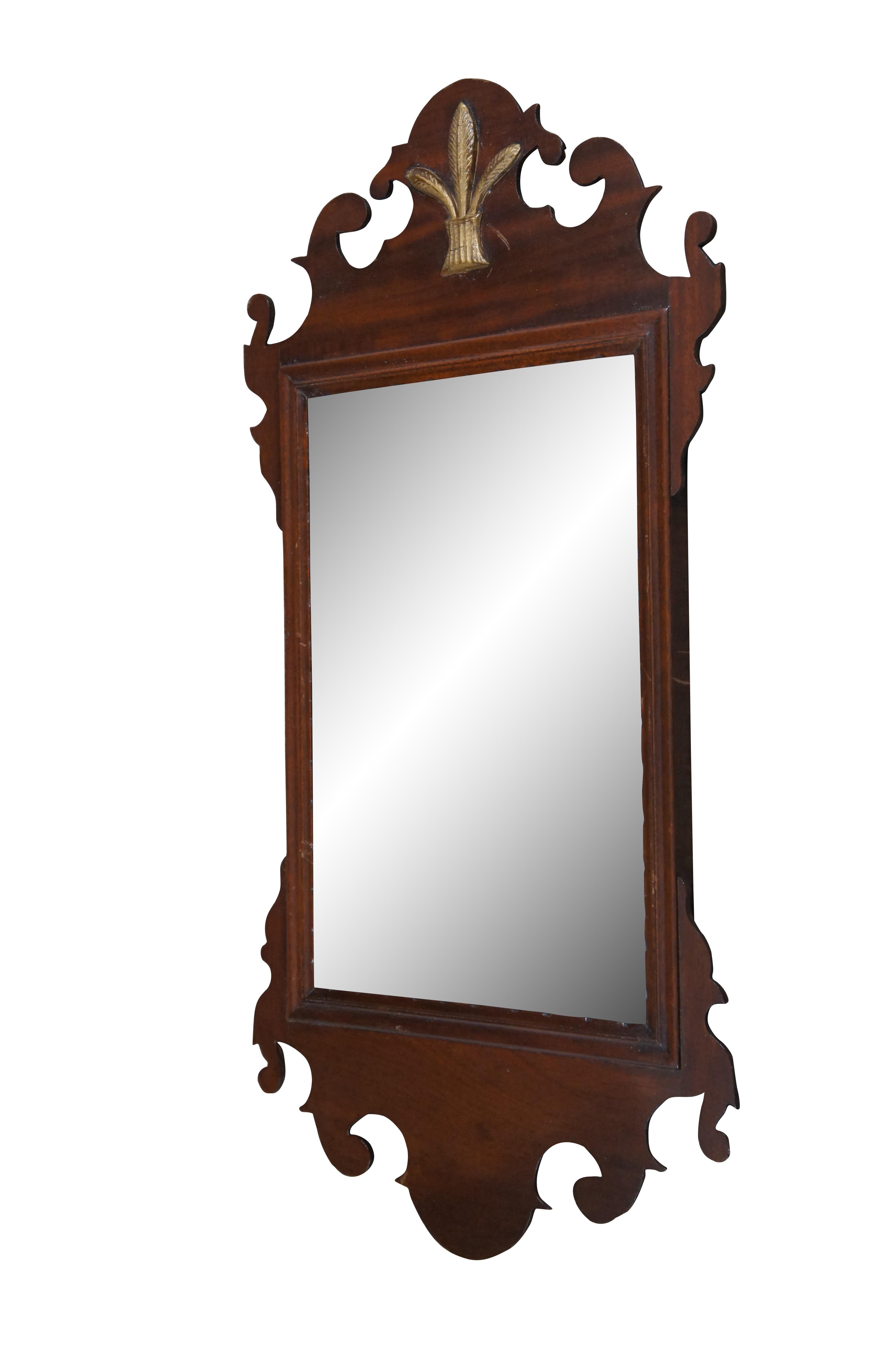 Antique mahogany Americna Federal style carved wall or vanity mirror with applied gilt plumage / trio of feathers accent.

Dimensions:
13