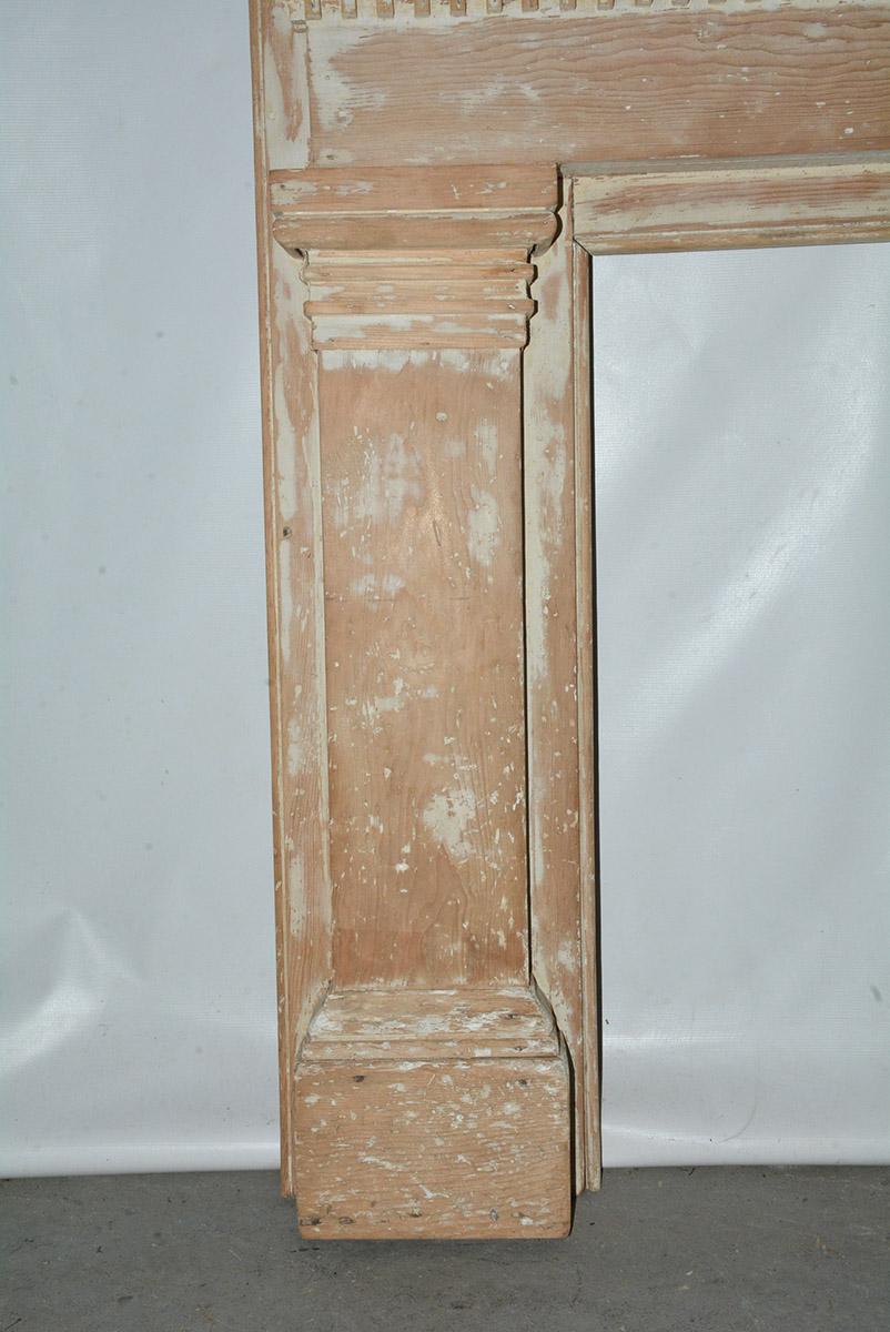 The original paint has been cleaned off and removed for you to decide how you would like to finish this wonderful antique American fireplace mantle with dental molding and handsome detailing.
The firebox opening measures 36 3/4