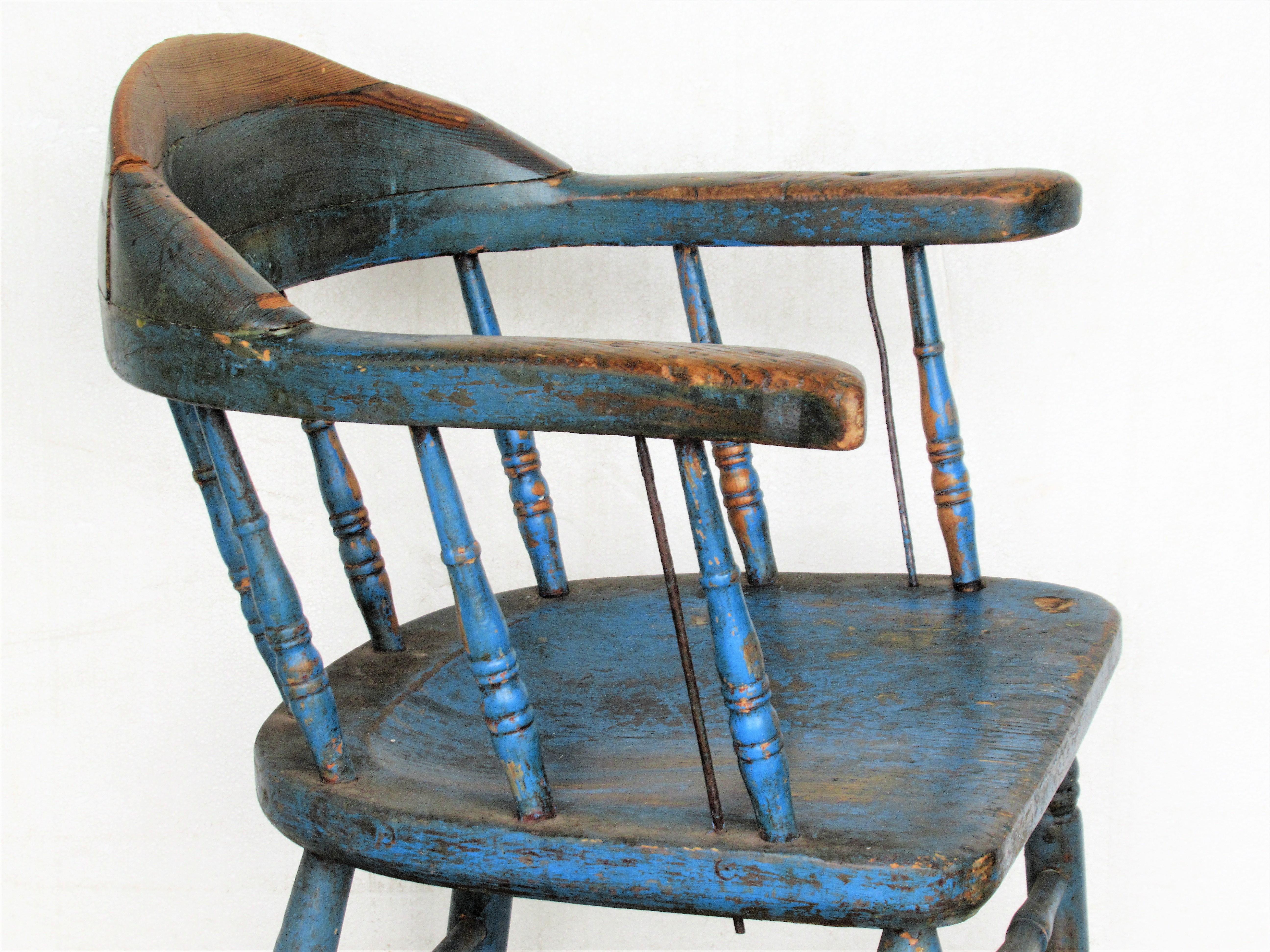 Antique American firehouse Windsor chair in beautiful old worn blue painted surface. New England, circa 1890. Look at all pictures and read condition report in comment section.