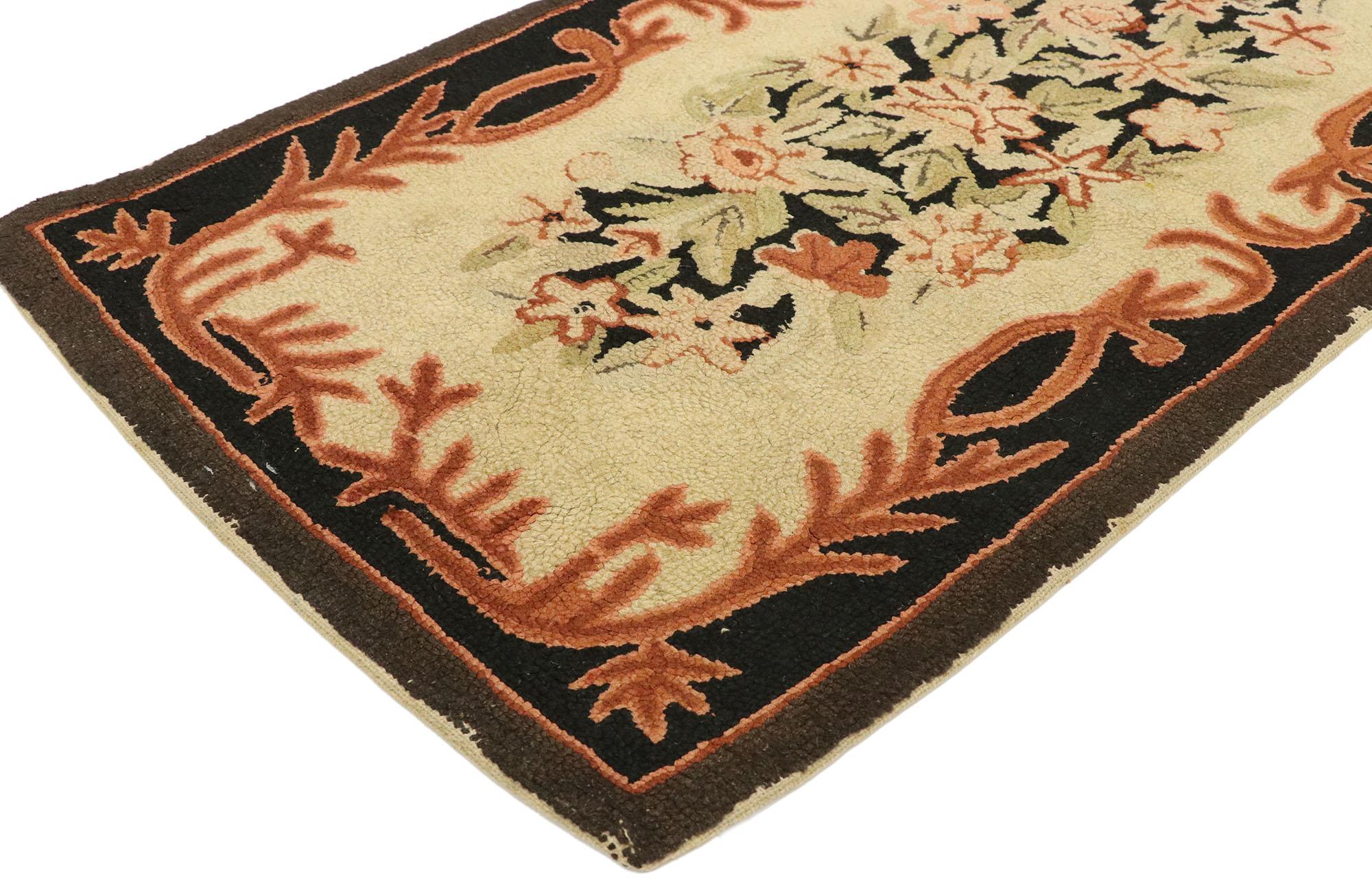 74358, antique American floral hooked rug with French Provincial style. This antique American hand hooked rug with French Provincial style features a decorative floral bouquet framed with an opulent frondescence border. Displaying a universal appeal