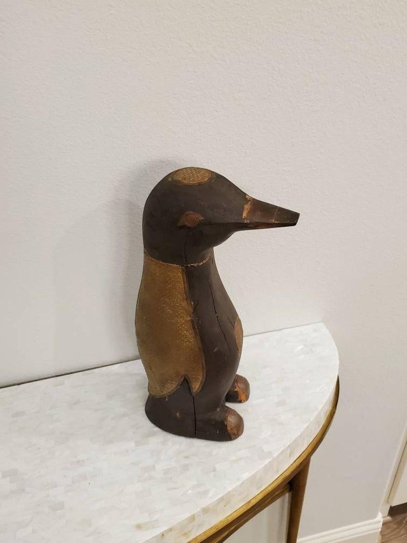 penguin wood carving