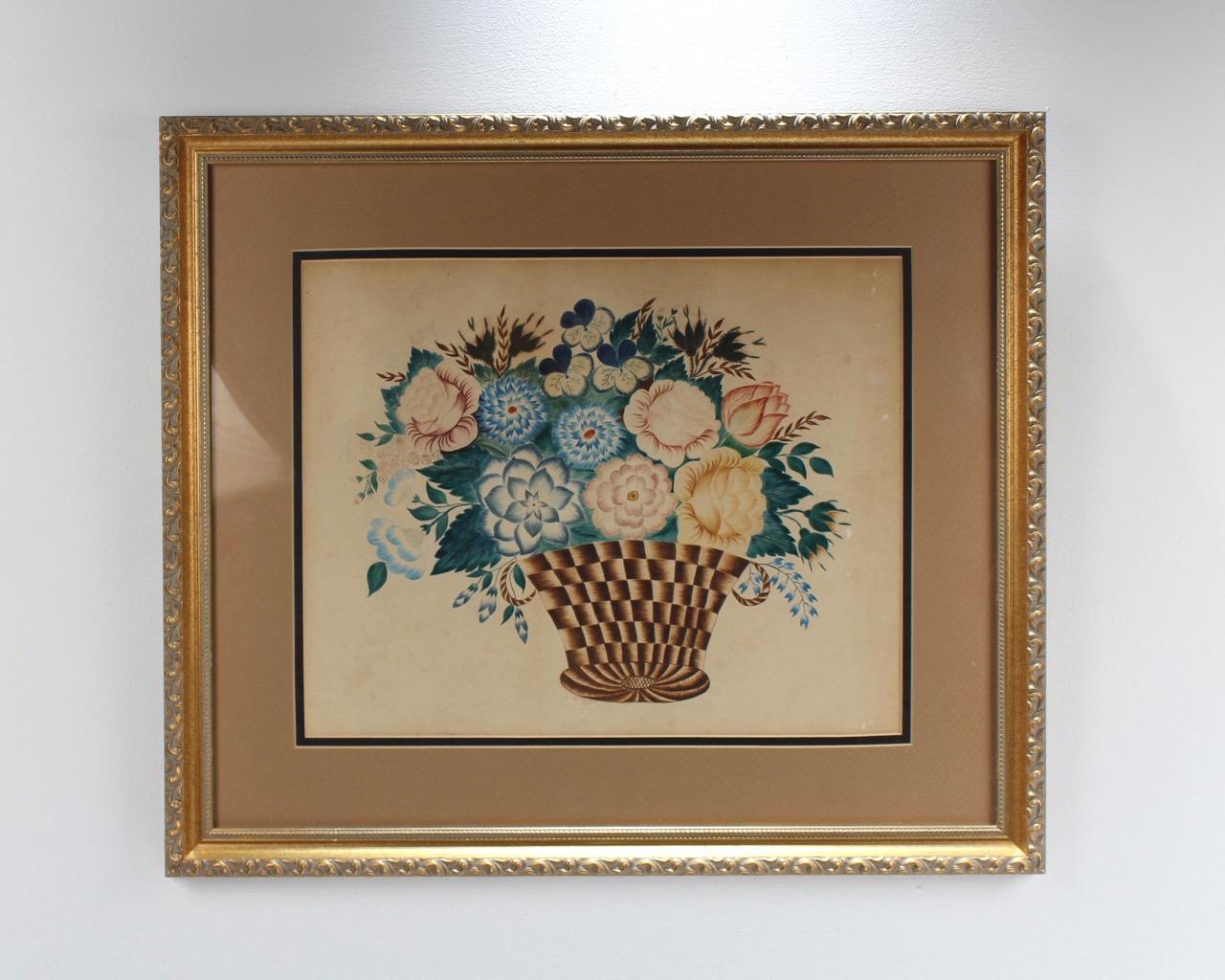 A very fine antique watercolor theorem of a basket with flowers.

Simply a compelling piece or American Folk Art!

Principally painted in blue and green tones for the flowers and leaf work. The basket comprised of browns. Painted on paper.