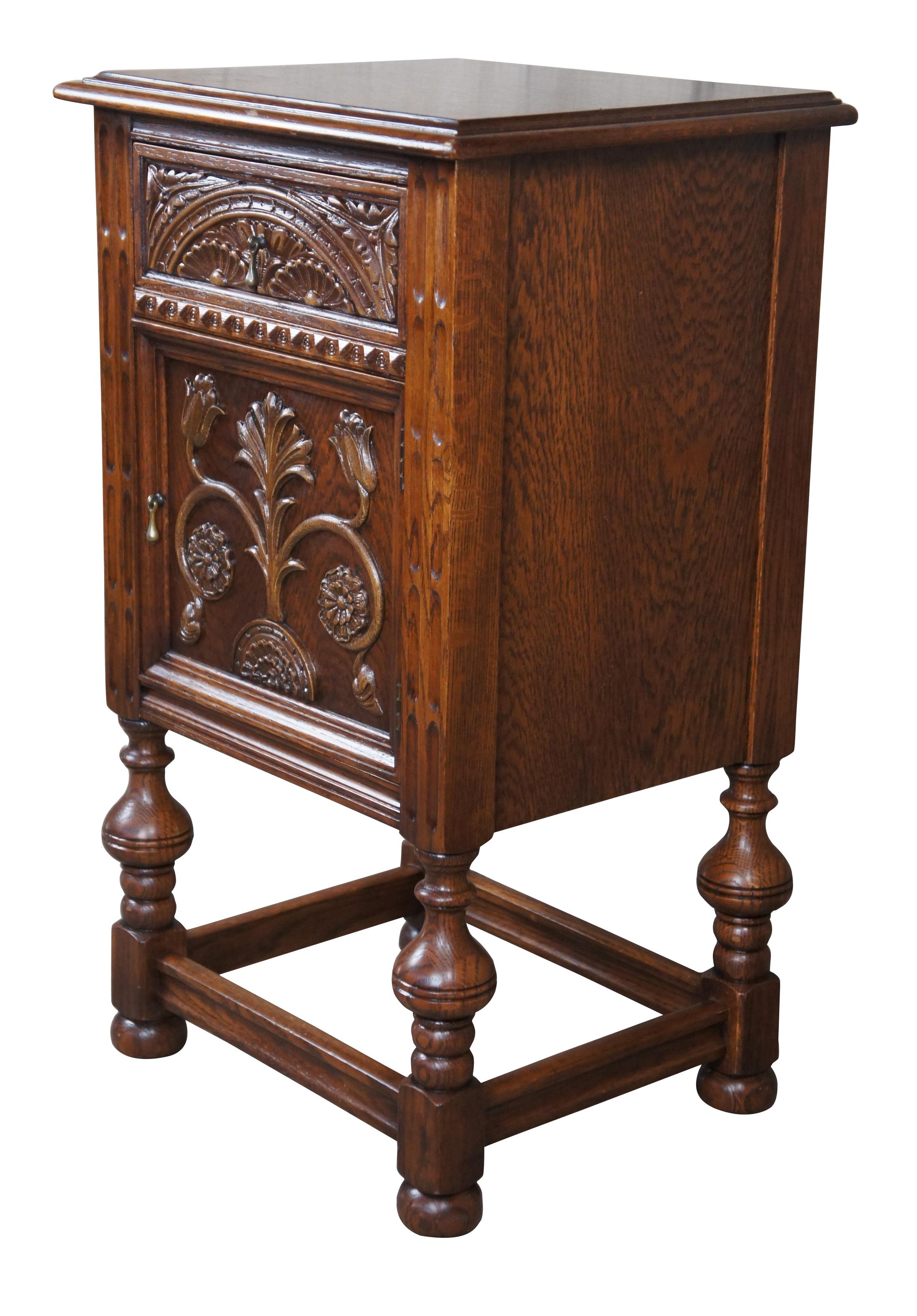 Antique American Furniture Company Gothic Revival nightstand, side table or plant stand. Made of oak featuring one drawer and one cabinet with carved floral accents and turned and fluted posts.

Operating out of Batesville Indiana since 1899, they