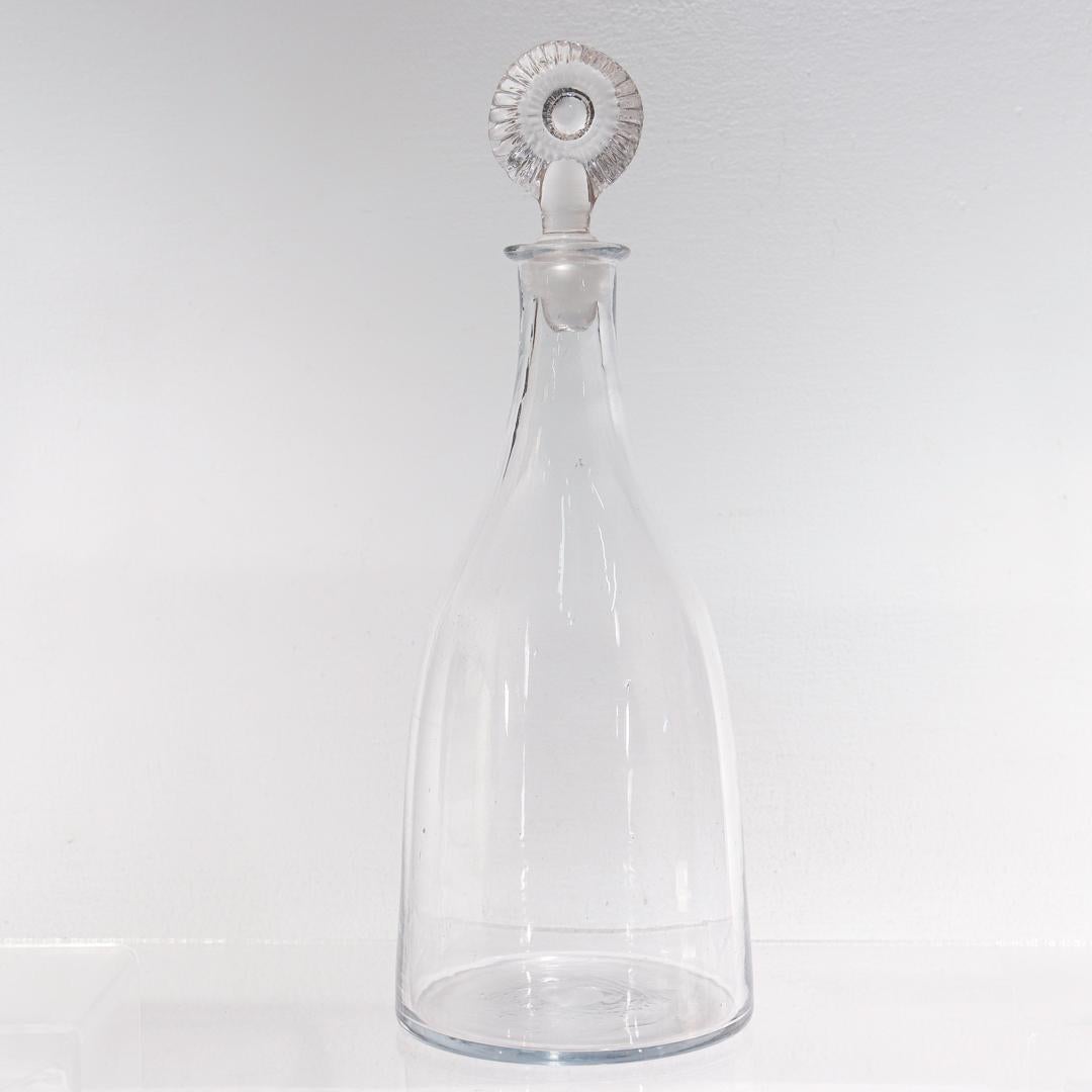A fine early tapered glass wine decanter.

Likely American in origin.

With tapered sides and a 