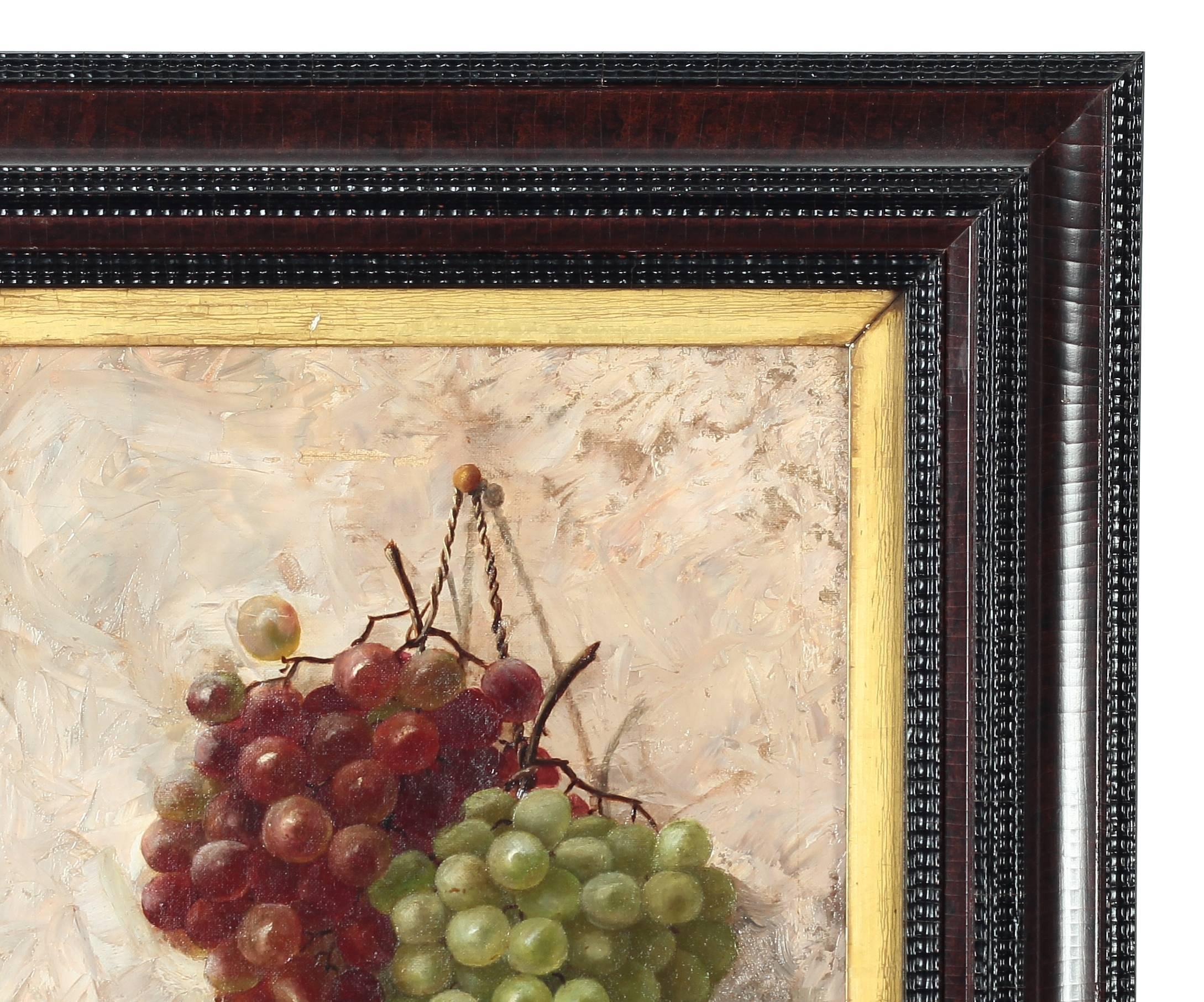 An oil on canvas painting 'Grapes Still Life'. An American piece that is unsigned, dating to the 19th century. The sight size measures 15.5 inches high by 11.5 inches wide and the frame size measures 23.25 inches high by 19.5 inches wide.