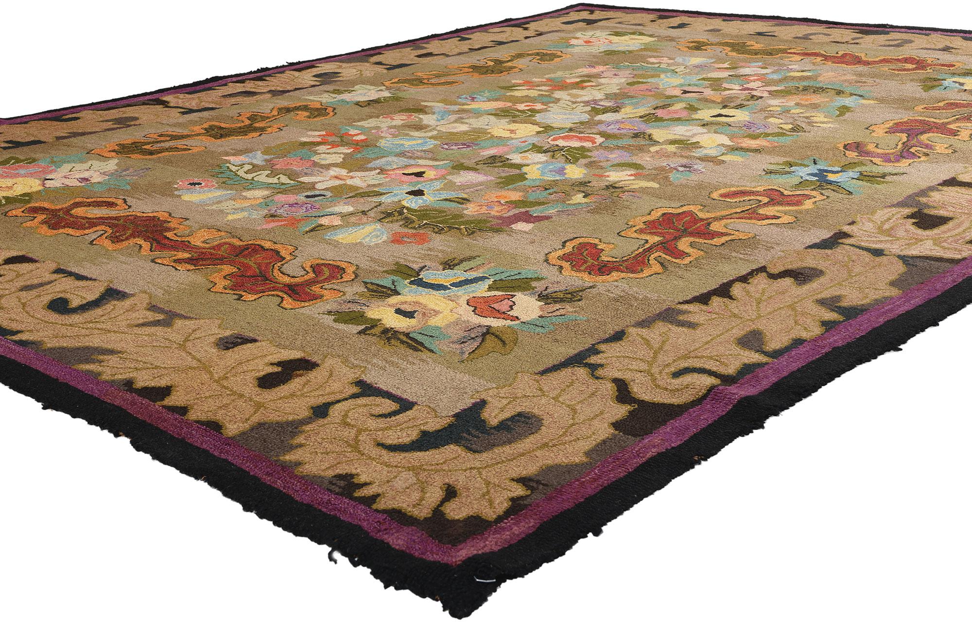 74176 Antique American Floral Hooked Rug, 08’09 x 11’10. An American hooked rug, crafted through the traditional technique of rug hooking, involves pulling loops of yarn or fabric through a base material like burlap or linen to create a textured