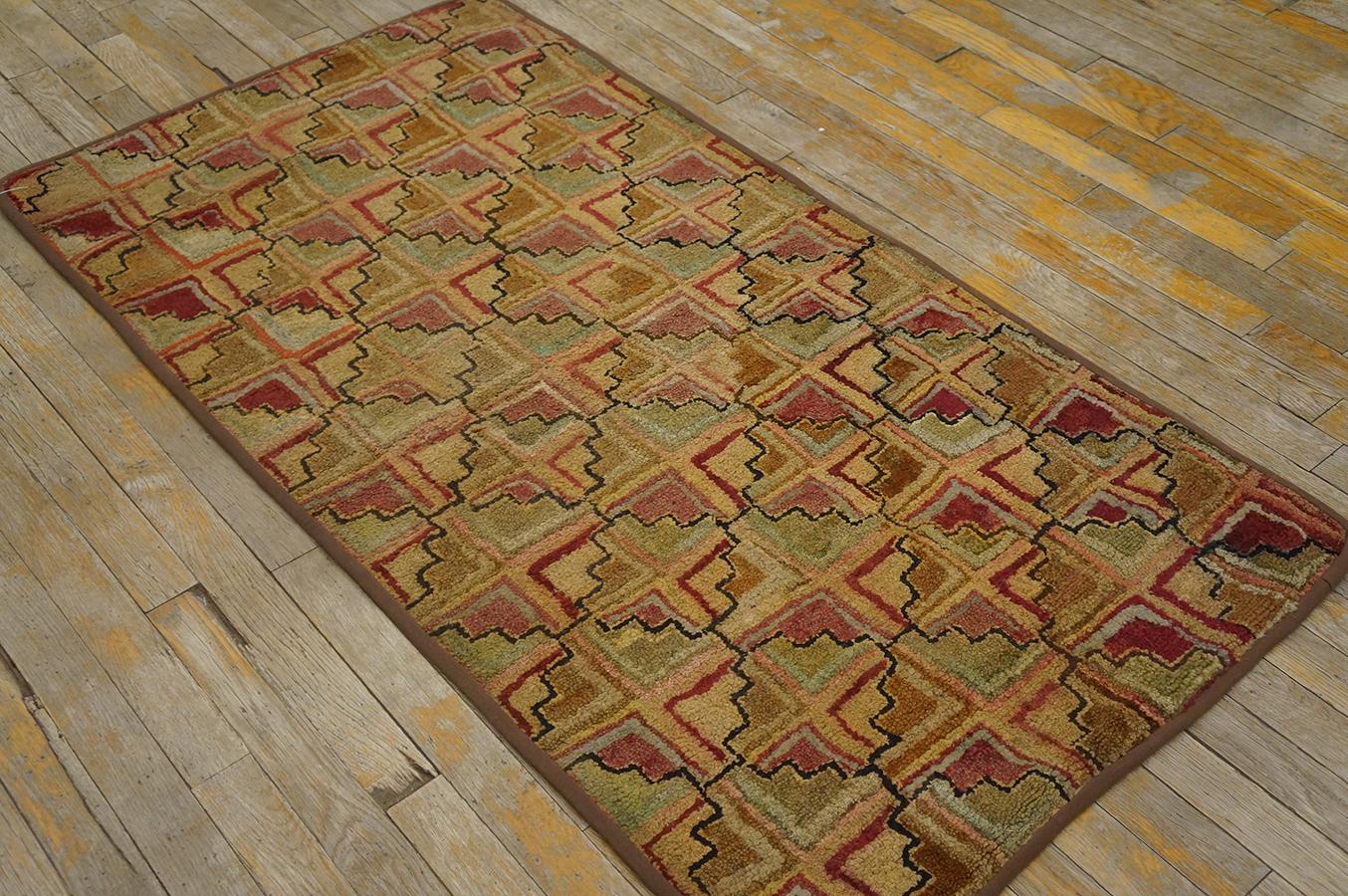 Antique hand-woven American Hooked rug. Green tone base multi color geometric pattern brown border. Well maintained circa 1910
Early 20th Century American Hooked Rug  (2' 7'' x 5' - 78 x 152 cm )