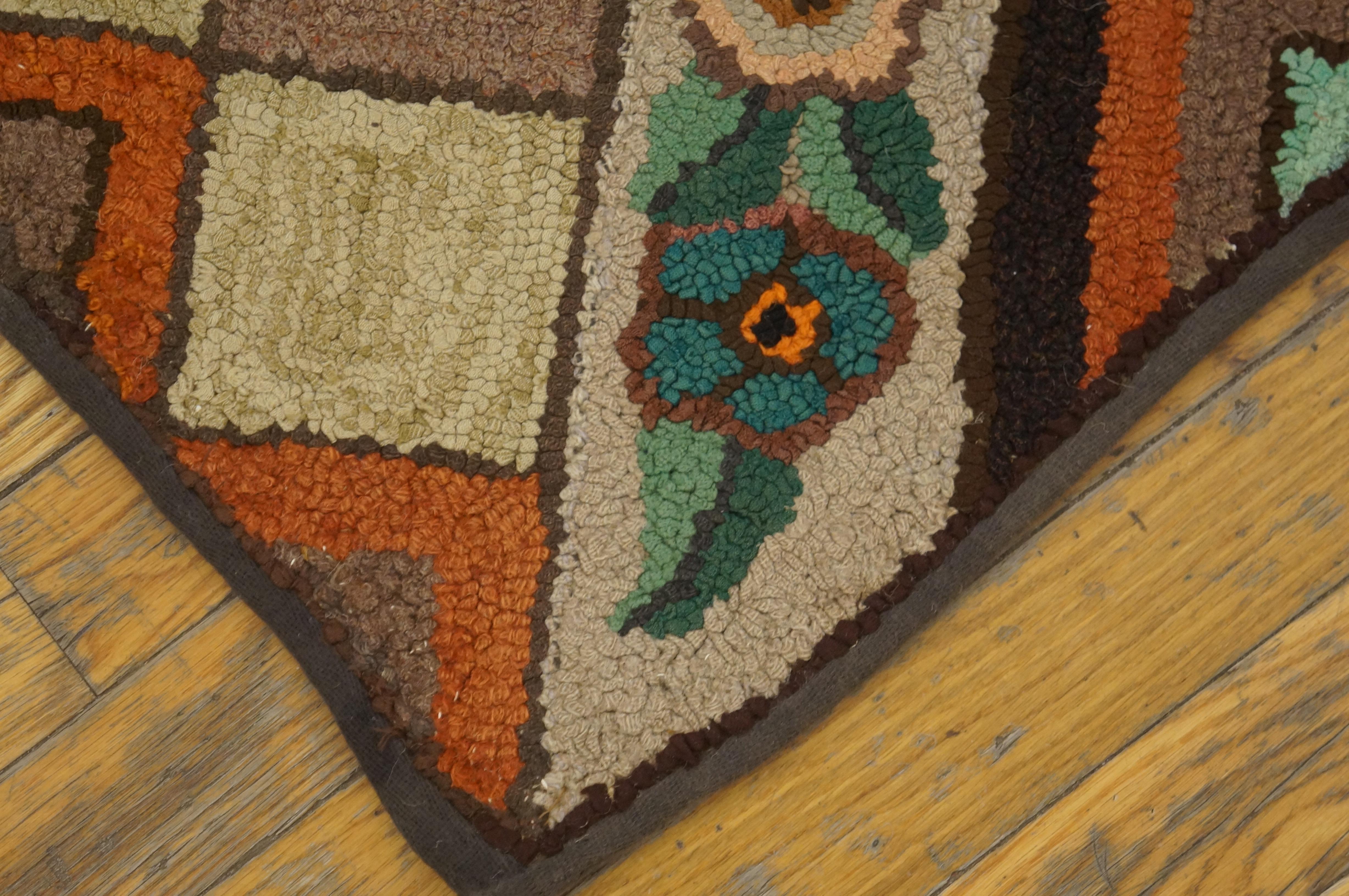 Antique American Hooked rug. Size: 2'0