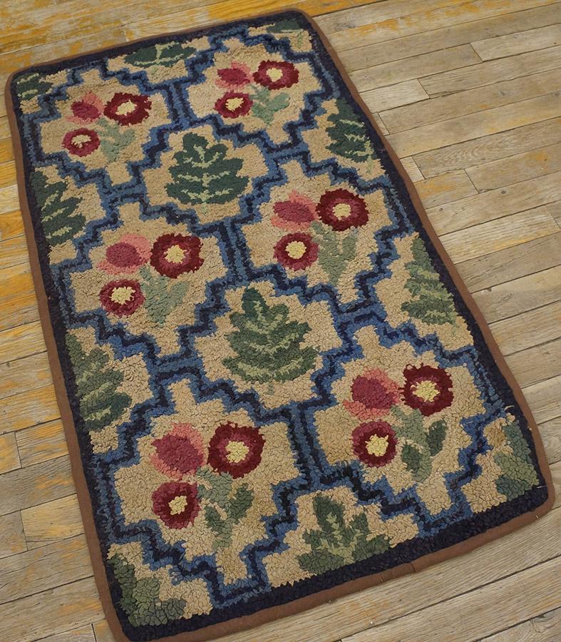 Antique American hooked rug. Measures: 2'0