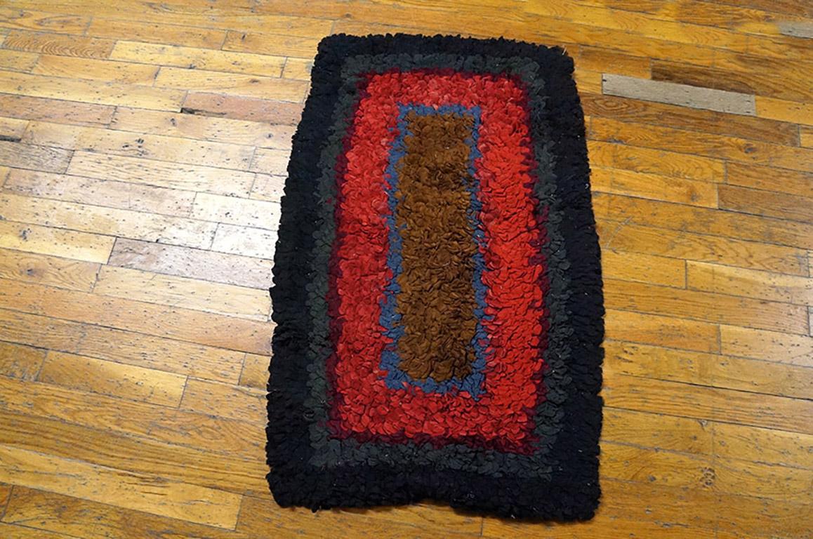 Antique American hooked rug. Size: 2'0