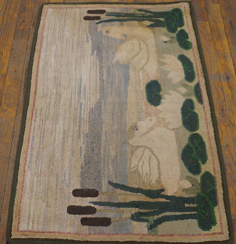 Antique American hooked rug. Measures: 2'2