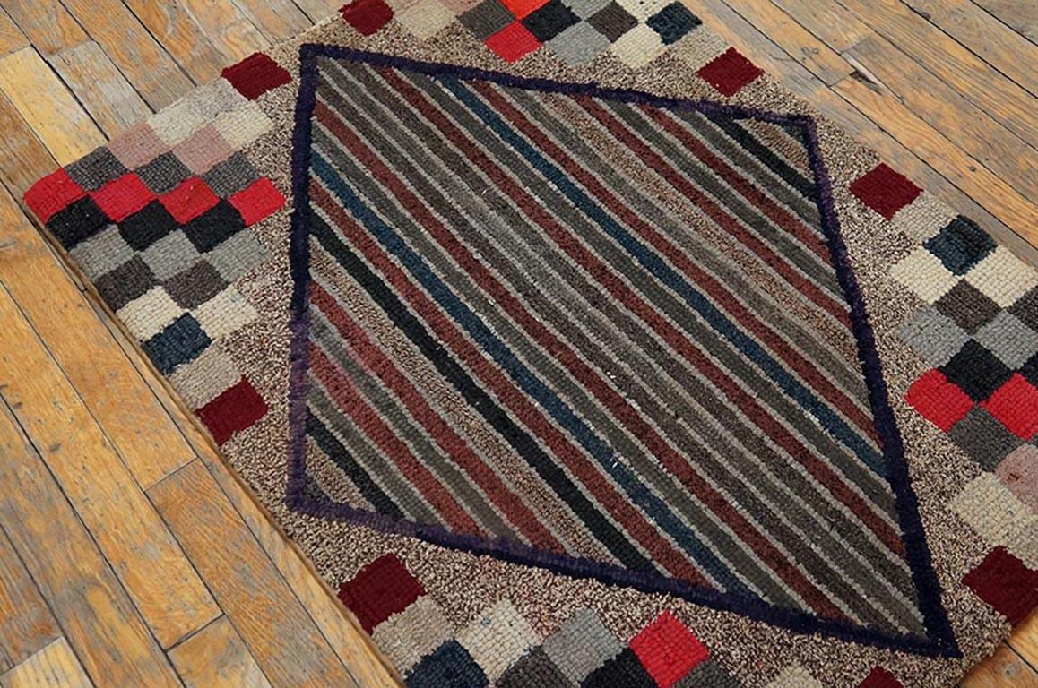Antique American Hooked rug. Size: 2'5