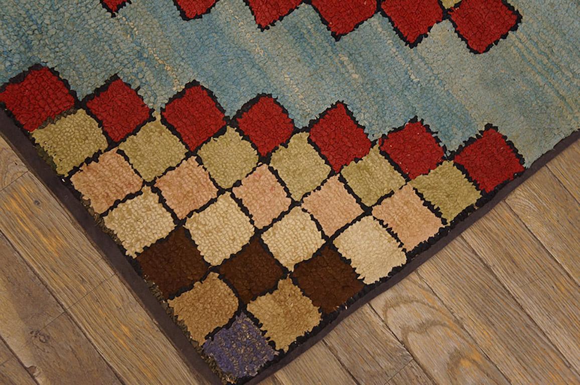 Antique American hooked rug. Measures: 3'0