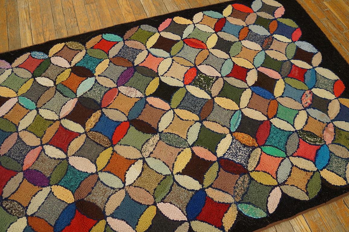 Antique American hooked rug. Size: 3'7
