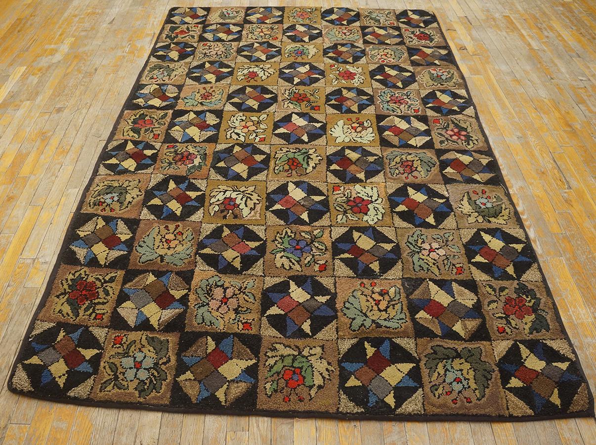 Antique American hooked rug measures:5'4