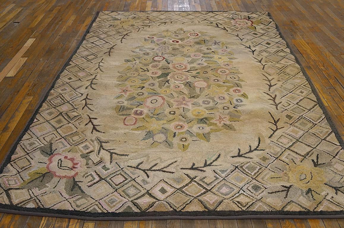 Antique American hooked rug. Measures: 5'9