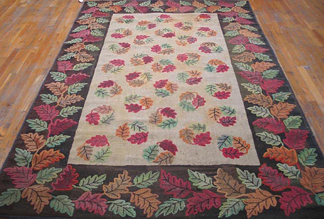 Antique American Hooked rug, size: 6' 0'' x 8' 10''.