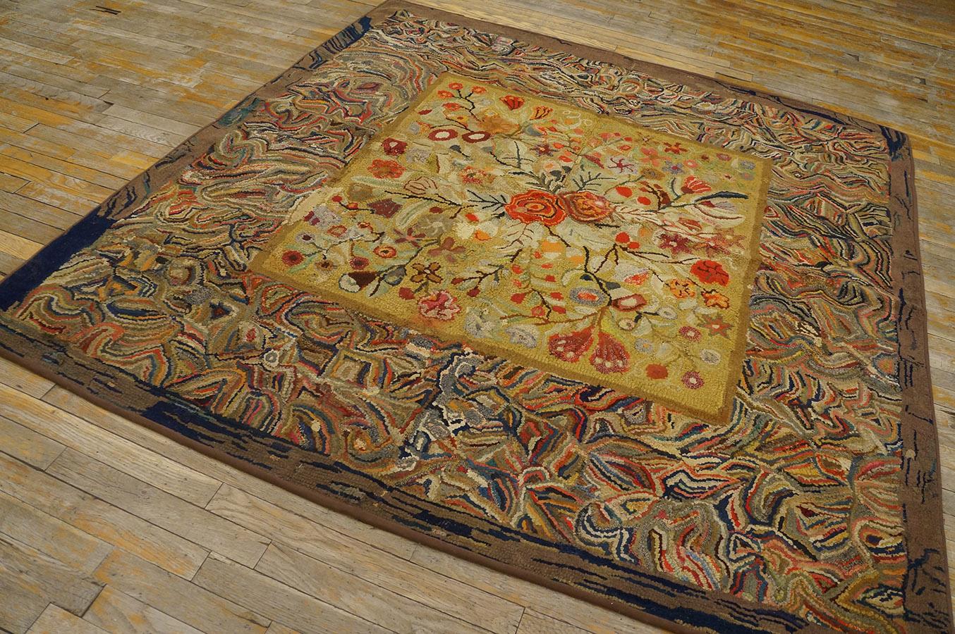 Antique American hooked rug. Size: 6' 5'' x 6' 5''.