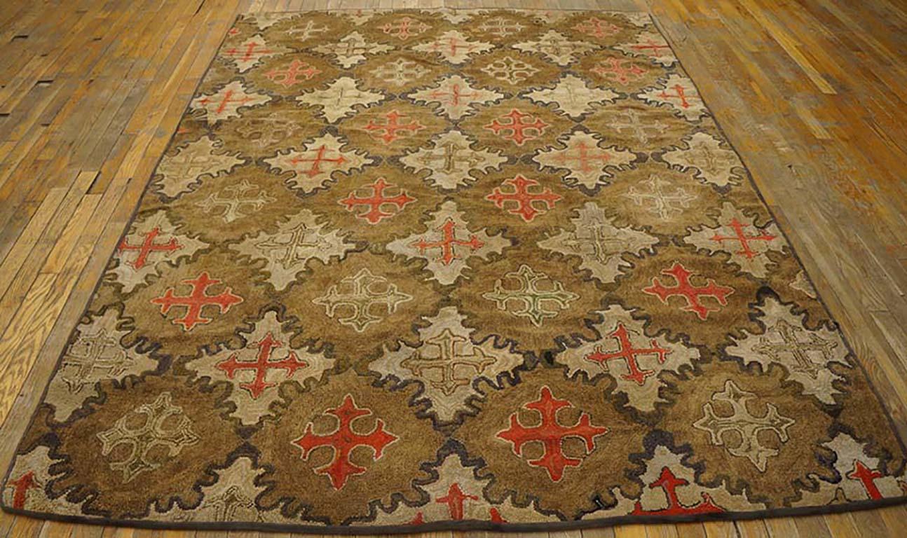 Antique American hooked rug. Size: 6'0