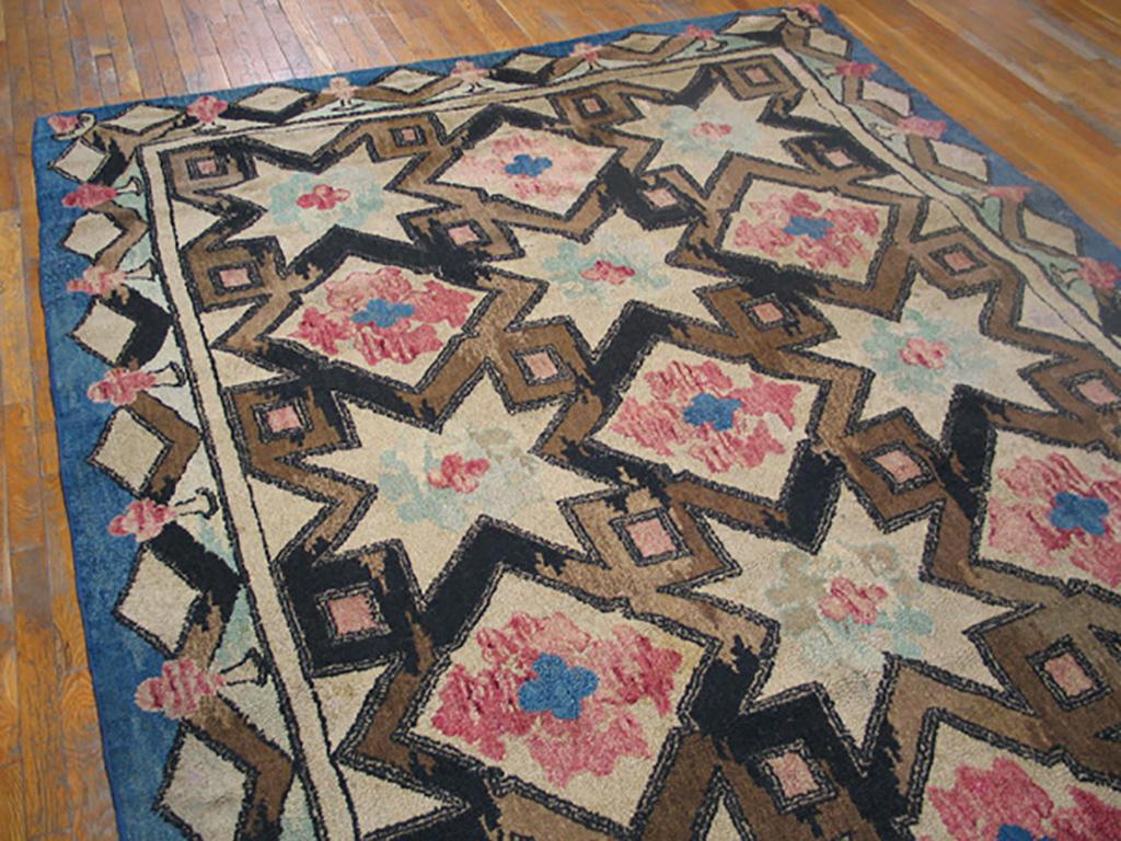Antique American hooked rug, size: 8'4