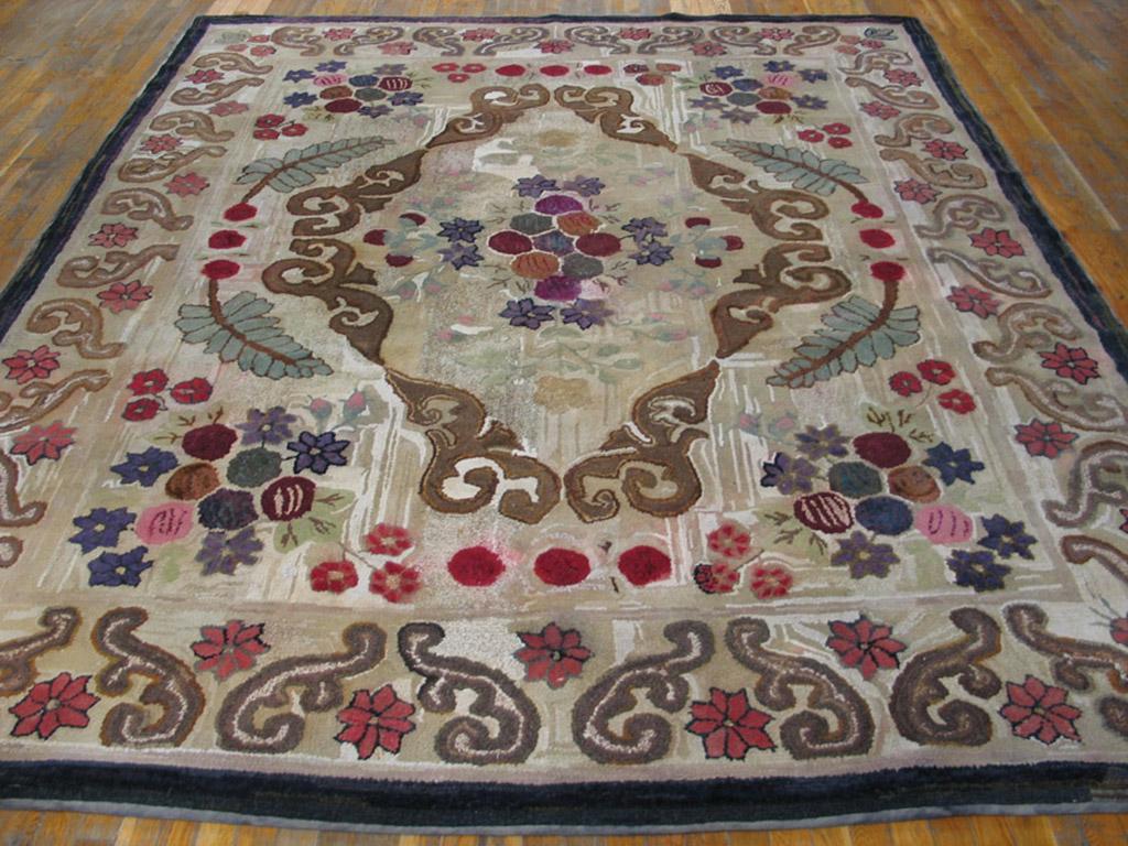 Antique American hooked rug, measures: 9'0