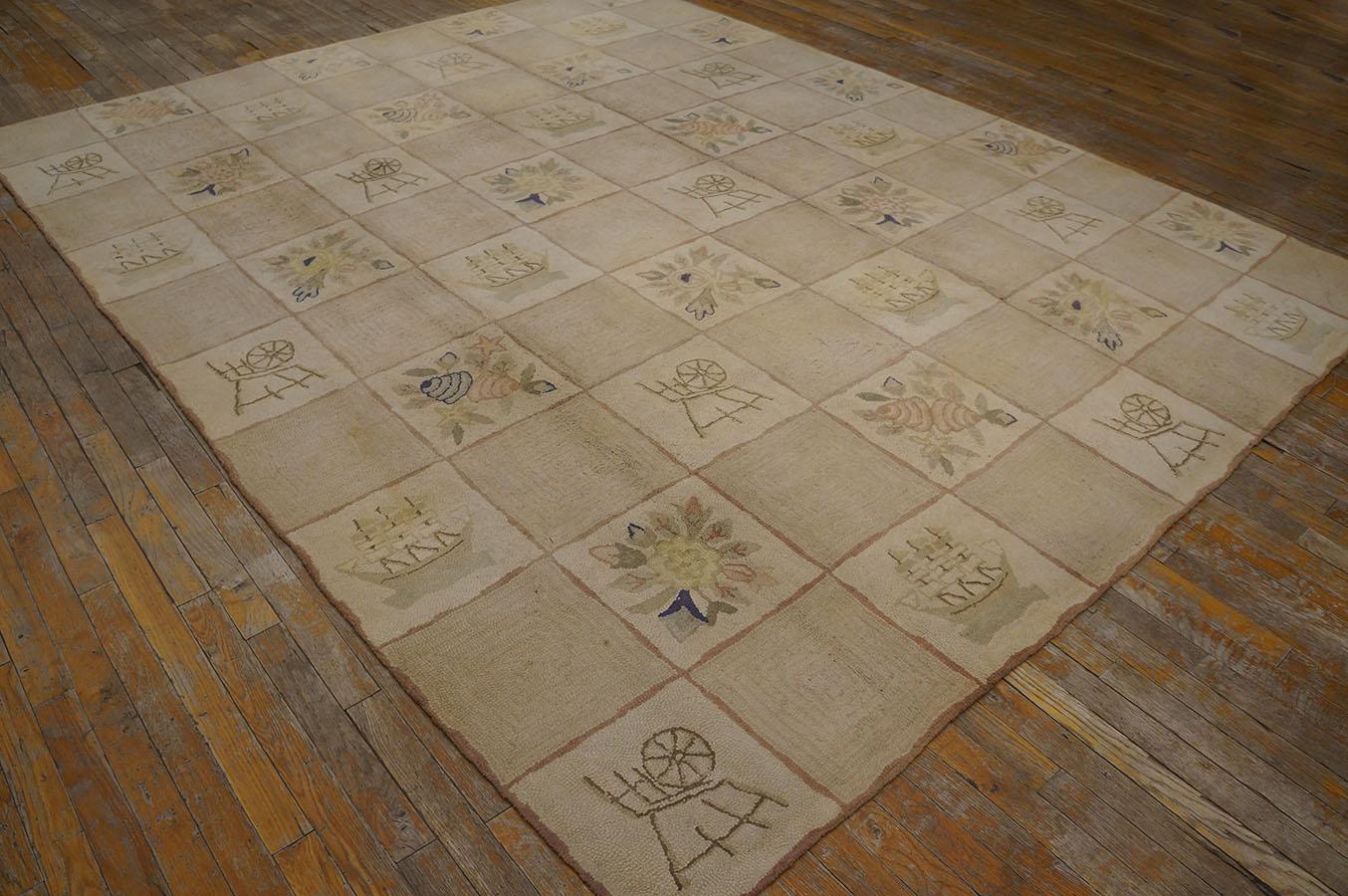 Antique American hooked rug. Measures: 8'0