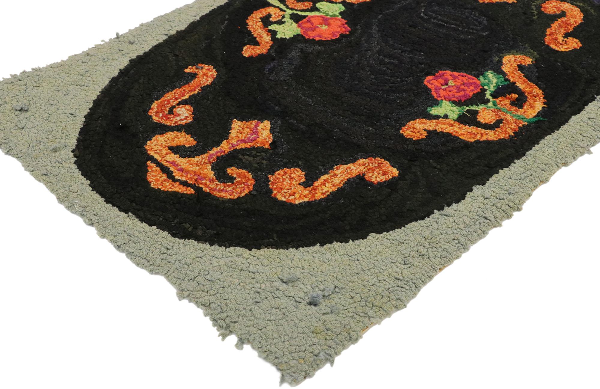 74354 antique American hooked rug with Caozy cottage Colonial style. With its Folk Art vibes and cozy cottage Colonial style, this antique American hooked rug charms with ease. The antique hooked rug features an abrashed charcoal black oval shaped