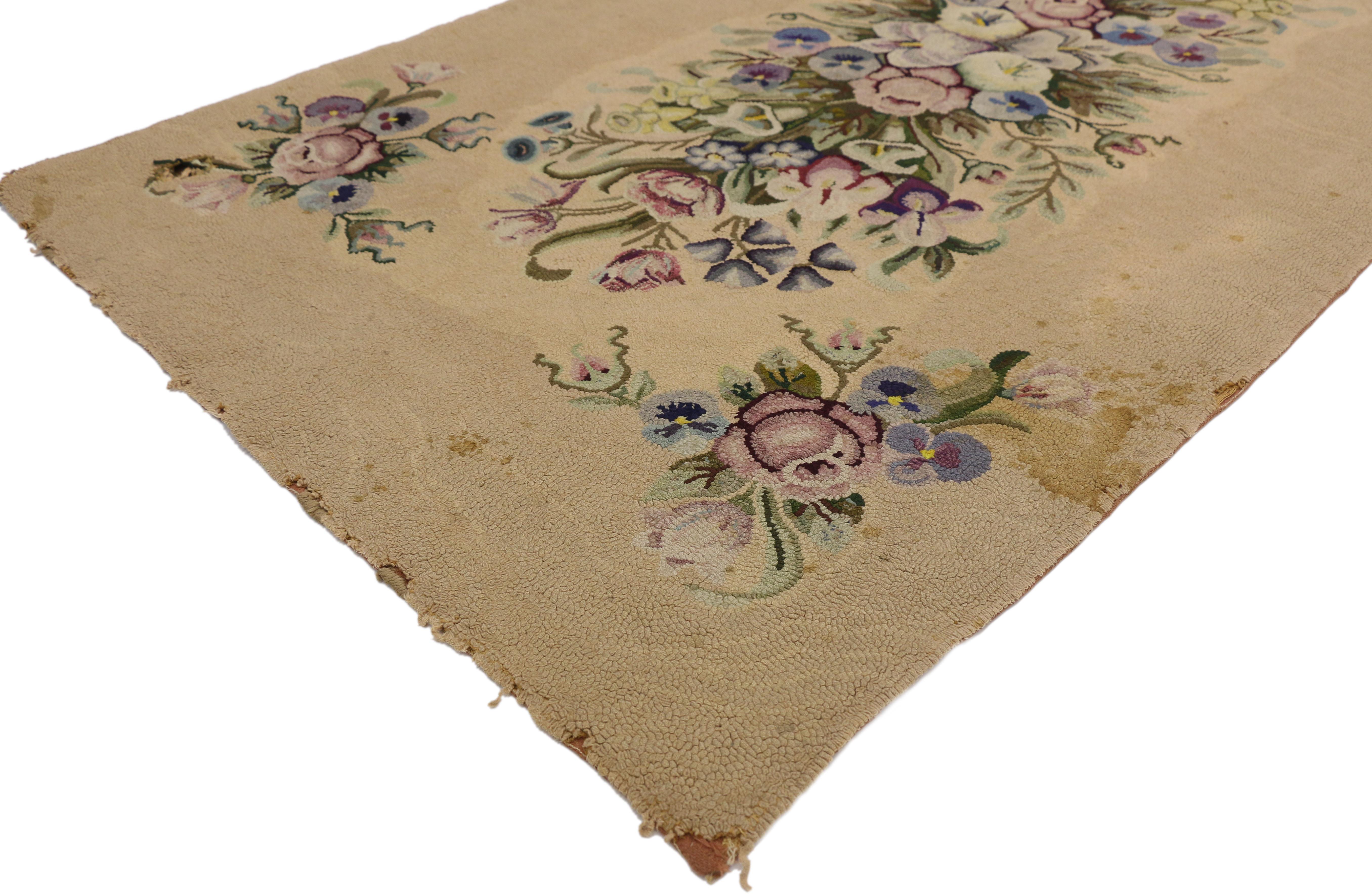 74344 Antique American Hooked rug with French Aubusson style. This antique American hand hooked rug with French Aubusson style features a decorative winter and spring floral bouquet composed of white Anthurium, pansies, daffodils, English primrose,