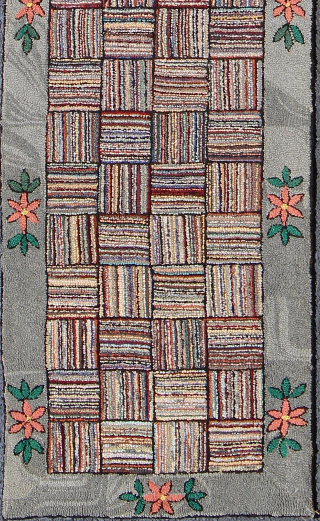 Antique American Hooked runner with colorful patchwork design, rug j10-1002, country of origin / type: United States / Hooked, circa 1920.

This vintage American Hooked rug depicts a beautiful patchwork design in a variety of colors. The entirety