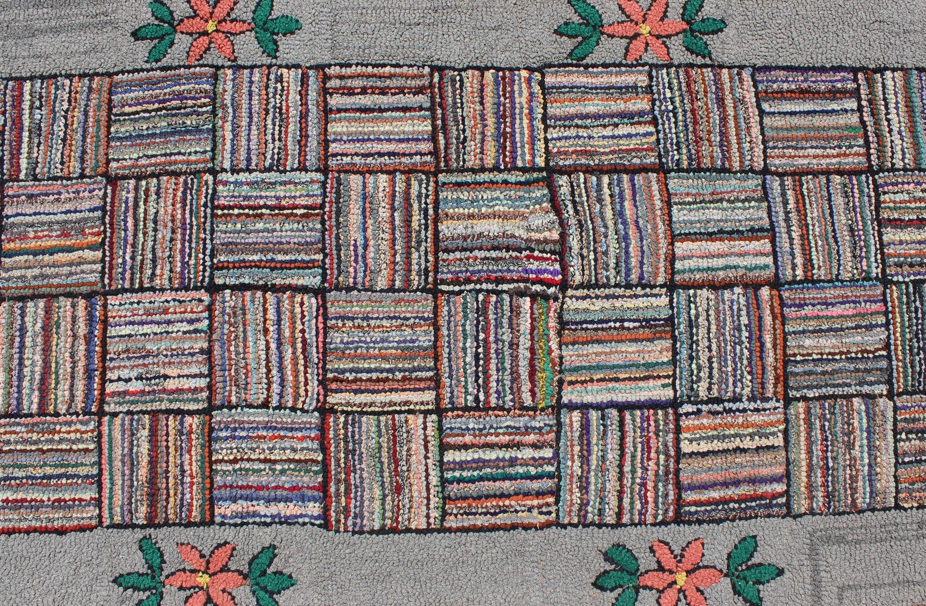 Early 20th Century Antique American Hooked Runner with Colorful Patchwork Design For Sale