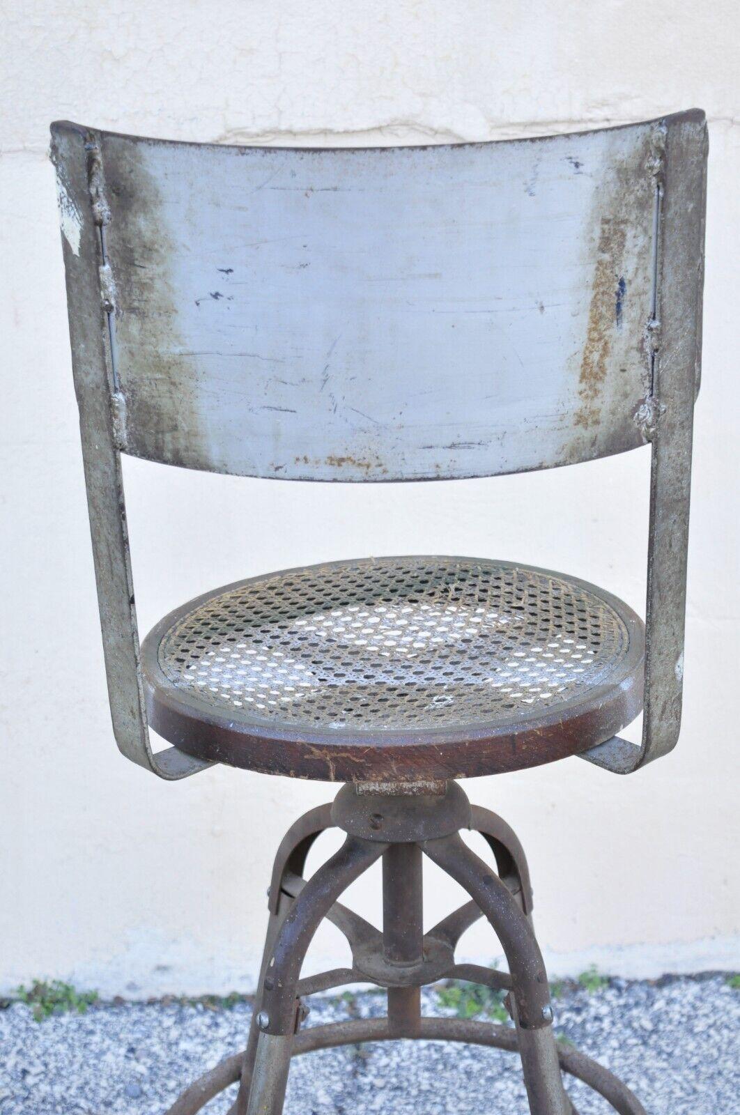 Antique American Industrial Metal Drafting Work Stool with Oak and Cane Seat For Sale 6