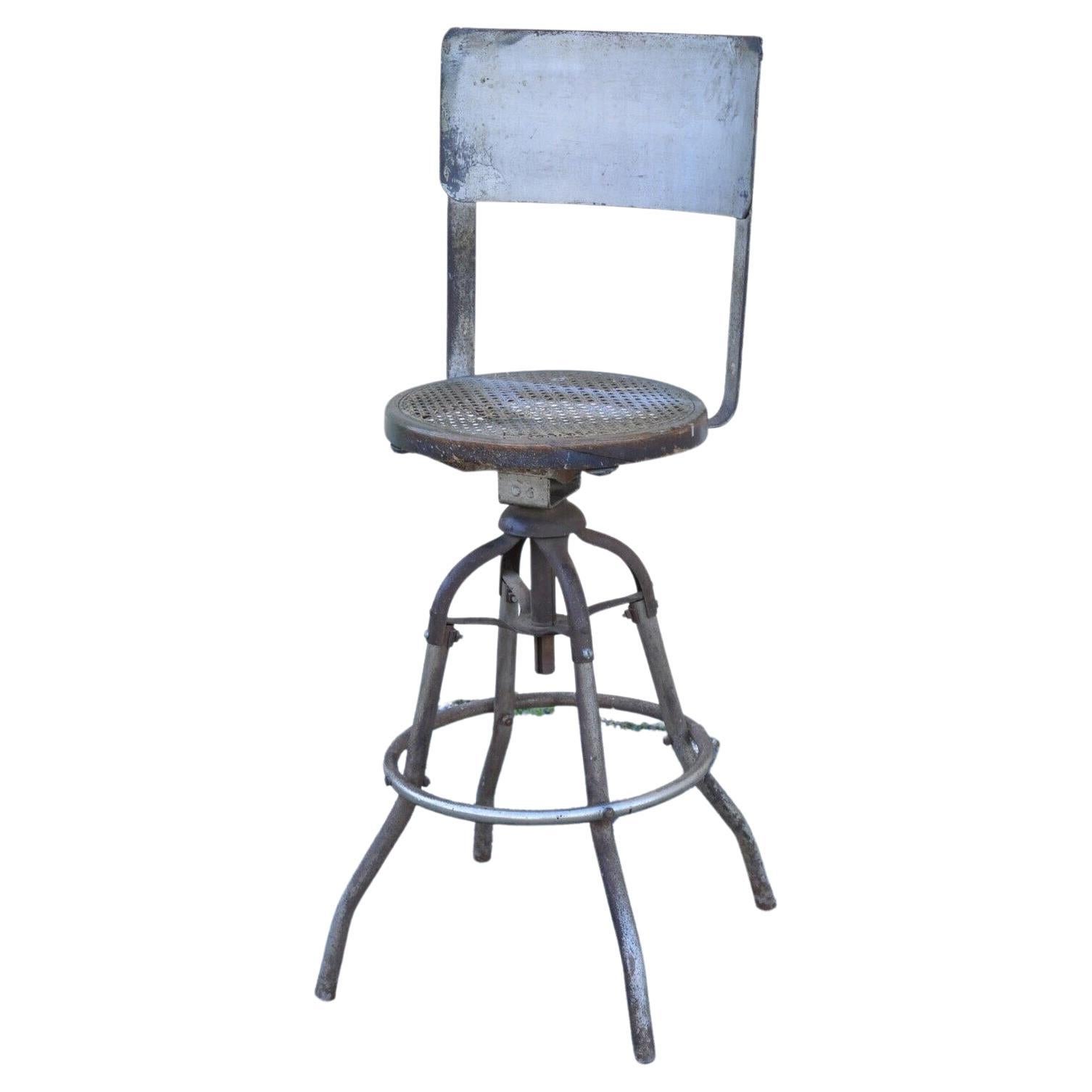 Antique American Industrial Metal Drafting Work Stool with Oak and Cane Seat For Sale