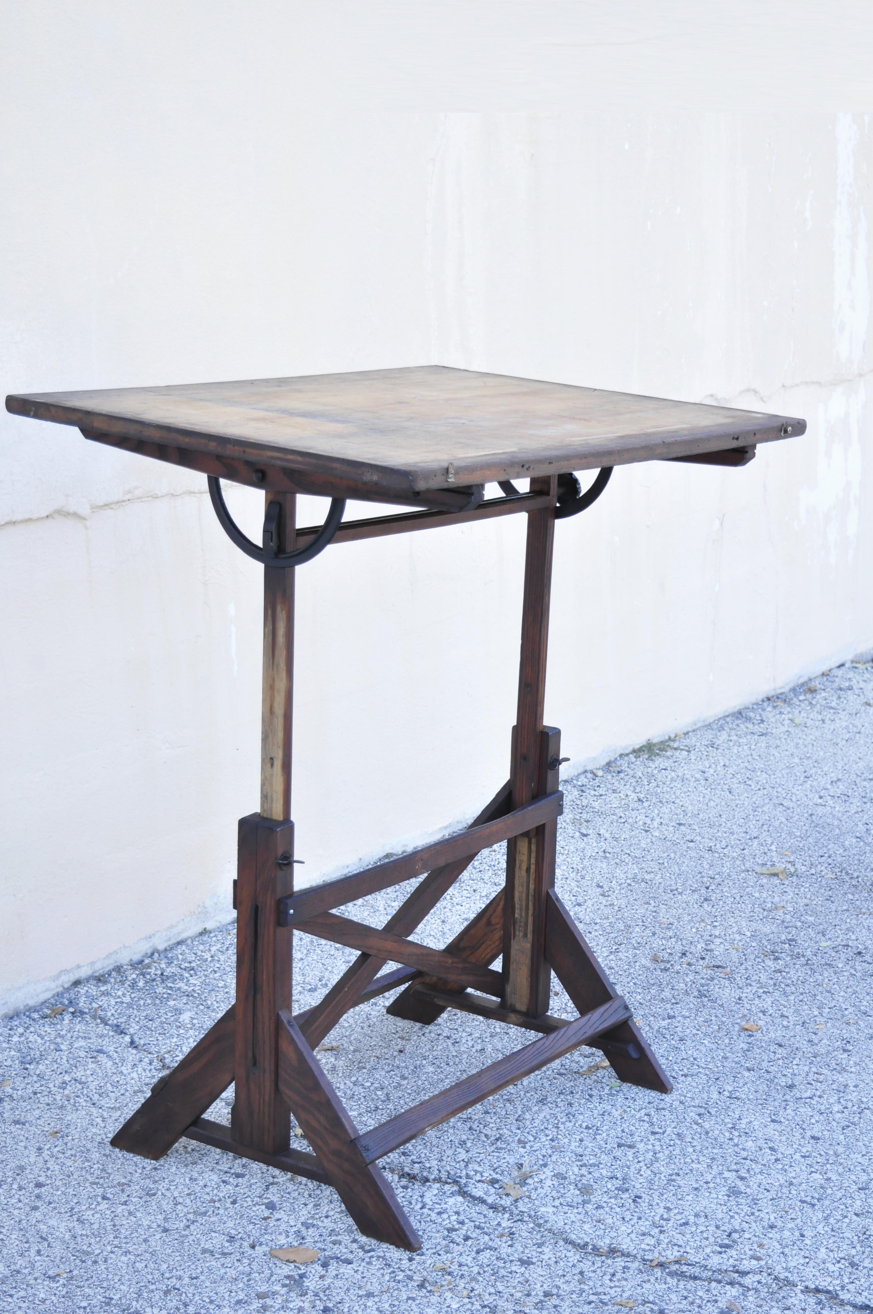 Antique American Industrial Oakwood and Cast Iron Drafting Table Work Desk In Good Condition In Philadelphia, PA