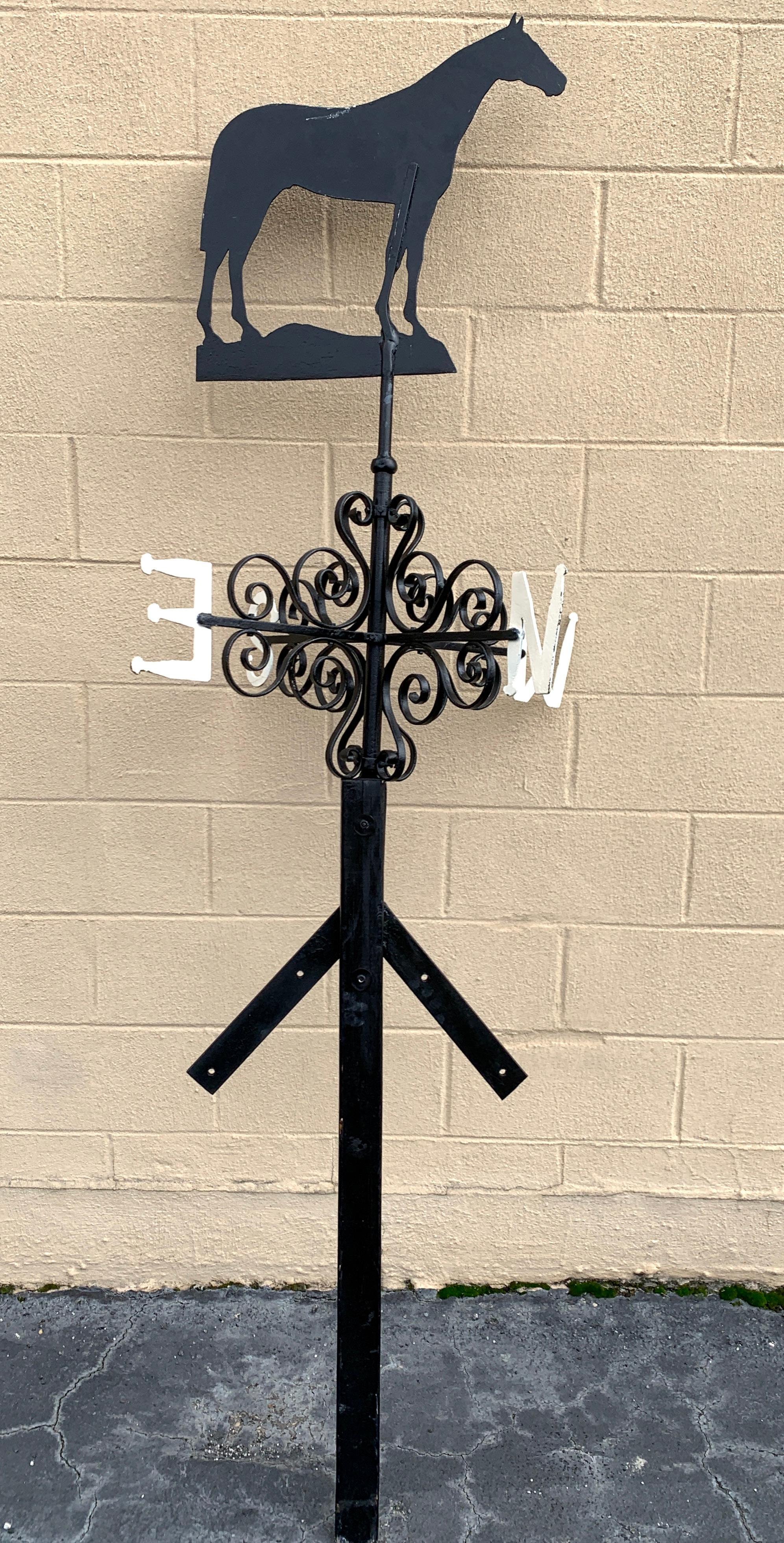 Antique American iron horse weathervane, Nashville TN, with moveable elaborate directional, mounted on a support base.
As shown on the support base stands 86