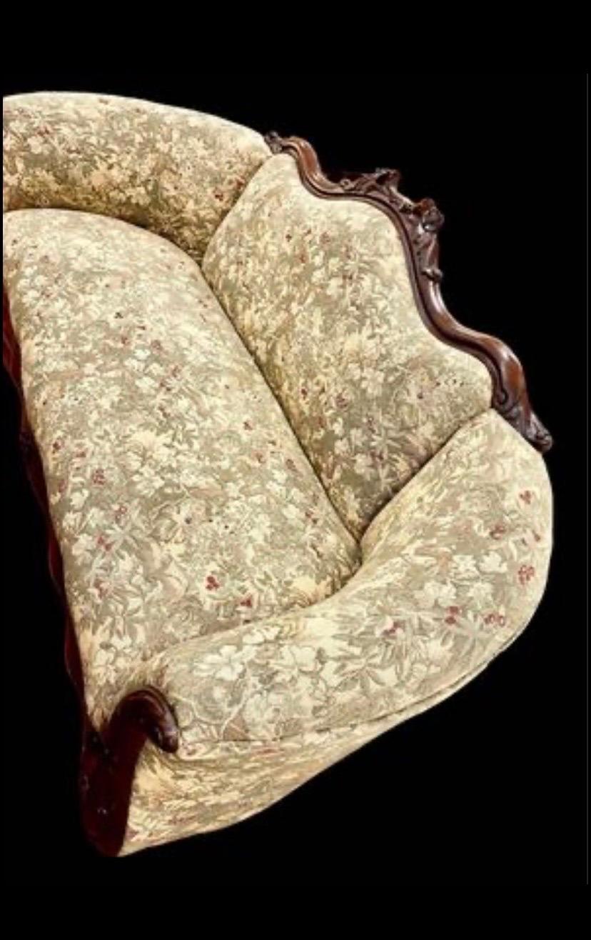 Newly and professionally re-upholstered in a quality Kravet tapestry antique American empire sofa with mahogany frame, circa 1850. A style you would see in the classic movie, 