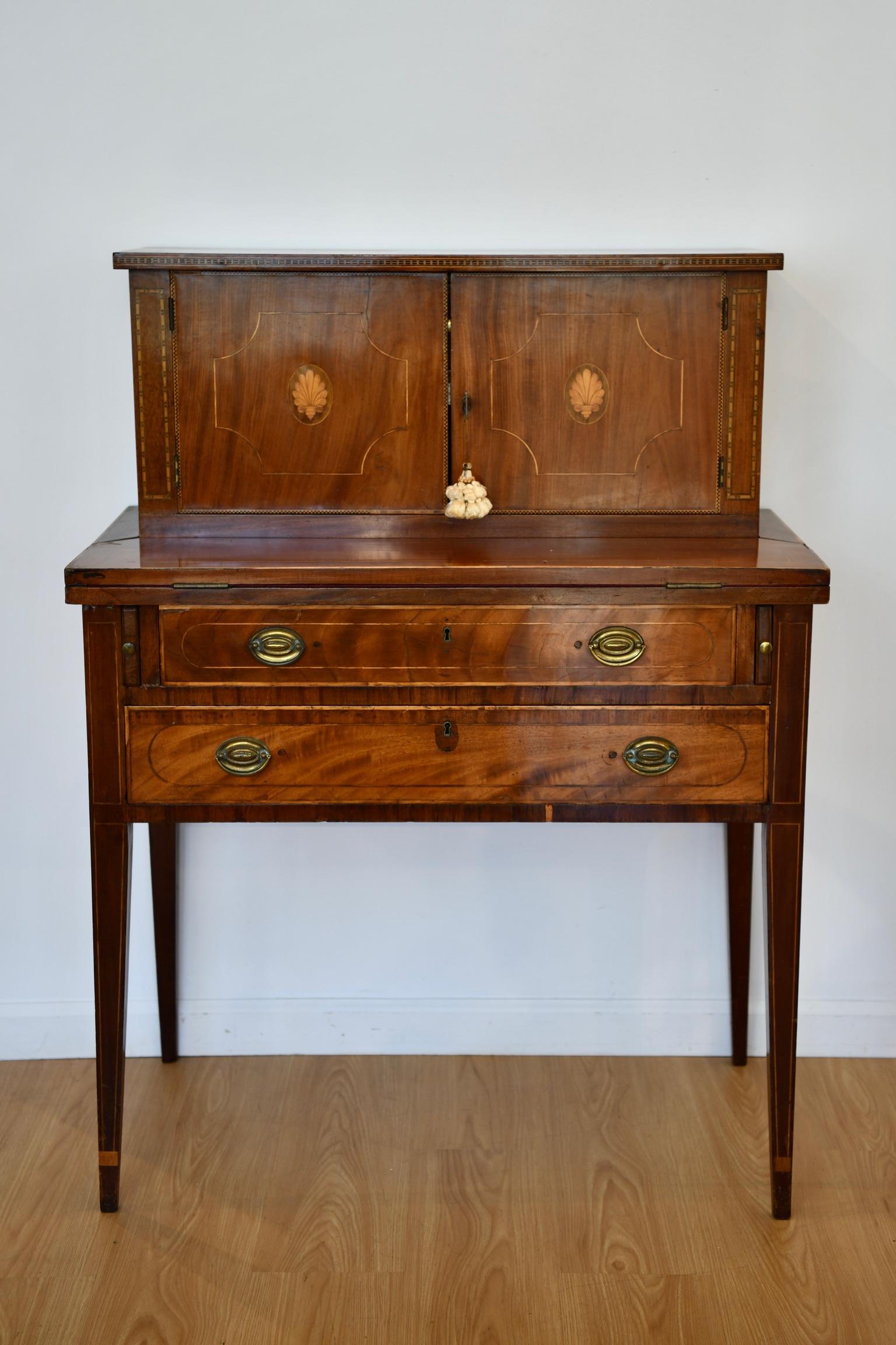 Antique American mahogany Sheraton secretary desk. Wear to felt on desk, pictured. Dimensions: 47