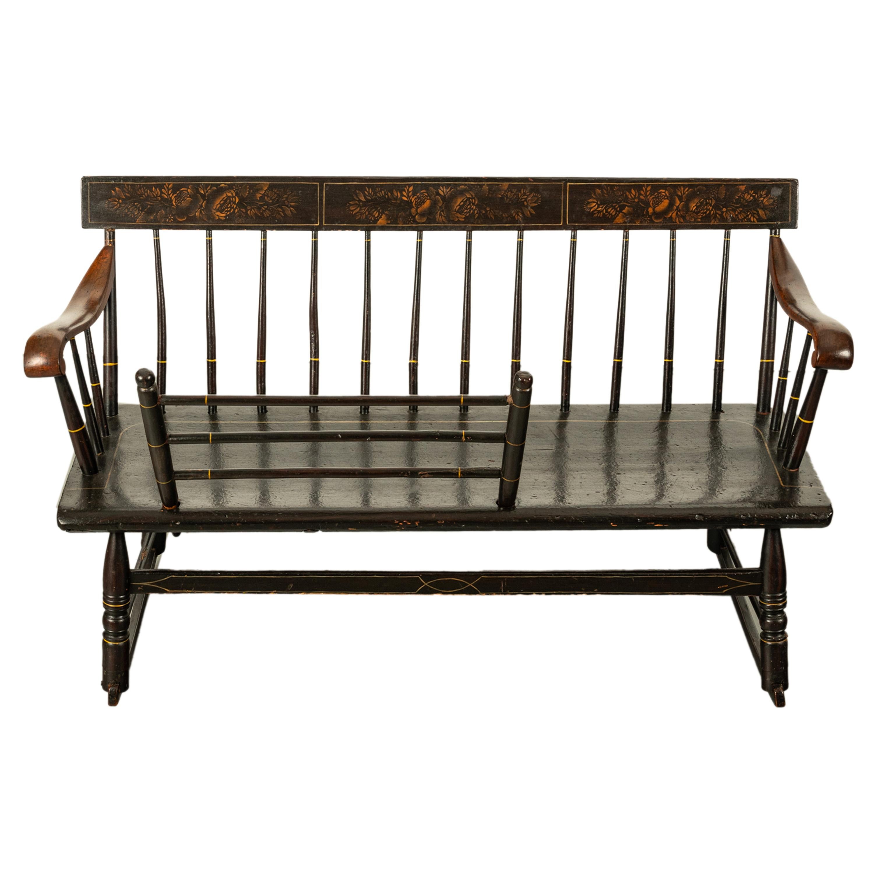 A very fine antique New England painted & stenciled Windsor rocking settee, Circa 1835.
These rocking settees were historically known as a 